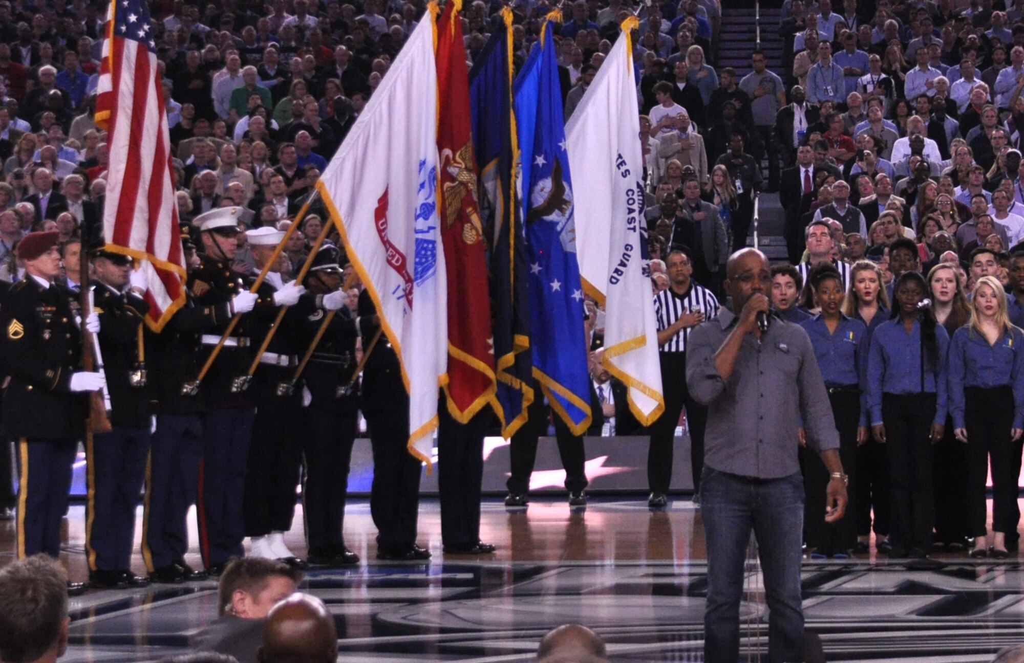 The 301st Fighter Wing Joint Color Guard performed at the opening ceremony before the start of the 2014 NCAA championship game where Darius Rucker sang the National Anthem. In the end, the University of Connecticut outlasted Kentucky, 60-54, at AT&T Stadium in Arlington, Texas, to win their fourth national title. (U.S. Air Force photo/Mr. Darryl Collins)