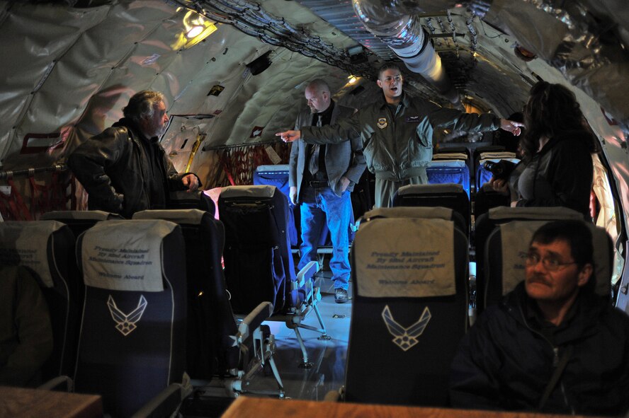 Staff Sgt. Derik Melson conducts a safety brief to Spokane Wash., civic leaders before their incentive flight at Fairchild Air Force Base, Wash., April 25, 2014. The Honorary Commanders and Eagles program pairs Spokane Civic Leaders with personnel at Fairchild to form a bond and familiarize the community with Fairchild operations fostering mutual understanding and establishing long lasting bonds of friendship. Melson is a 93rd Air Refueling Squadron boom operator. (U.S. Air Force Photo by Staff Sgt. Alexandre Montes/Released)
