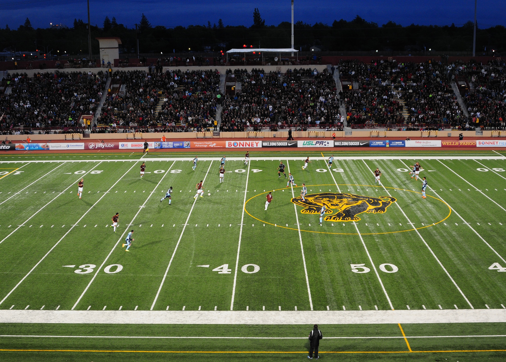 The Sacramento Republic FC advances the ball during its inaugural home game at April 26, 2014 in at Hughes Stadium in Sacramento, Calif., April 26, 2014. The Republic vs. Harrisburg City Islanders match-up drew a USL Pro Soccer game regular-season record of 20,231 fans. (U.S. Air Force photo by Senior Airman Allen Pollard/Released)