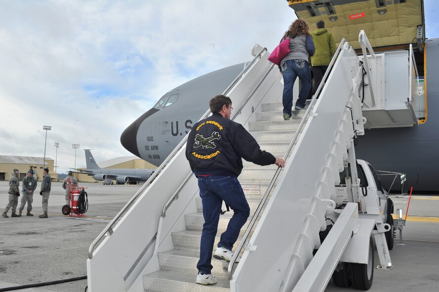 Spokane Civic leaders board a KC-135 Stratotanker aircraft for their incentive flight at Fairchild Air Force Base, Wash., April 25, 2014. (U.S. Air Force Photo by Staff Sgt. Alexandre Montes/Released)