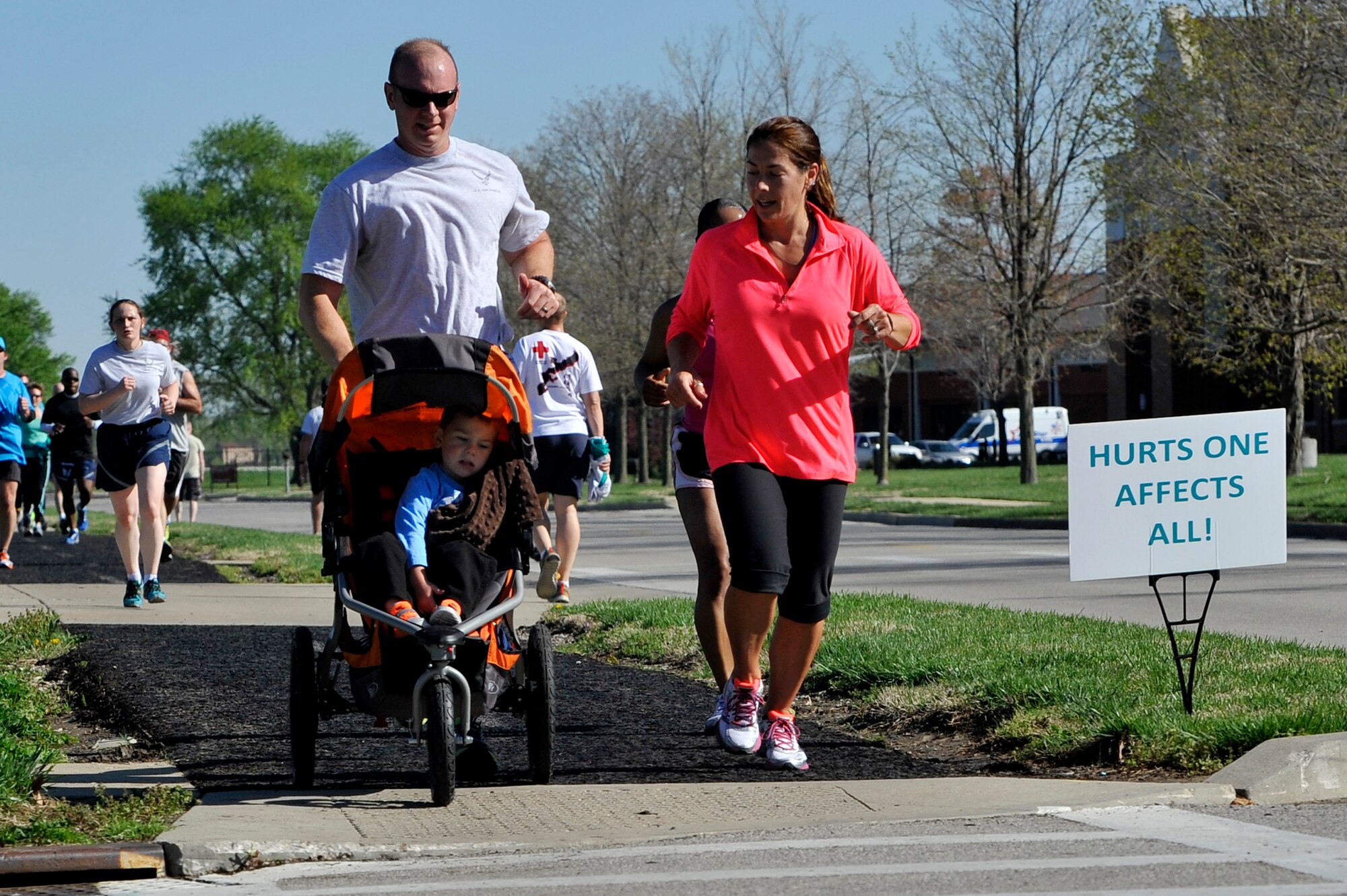 The 325 participants began the 5k run April 25, 2014 at Scott Air Force Base, Ill. Some participants wore the color teal to represent sexual assault awareness and prevention. Medals were also given to fastest female and male, first participant to show up, youngest participant, and many more. "Not only did units show up in full teal force, their commanders were right there with them," said 1st Lt. Danielle Duso, the deputy Sexual Assault Response Coordinator. (U.S. Air Force photo/ Airman 1st Class Kiana Brothers)