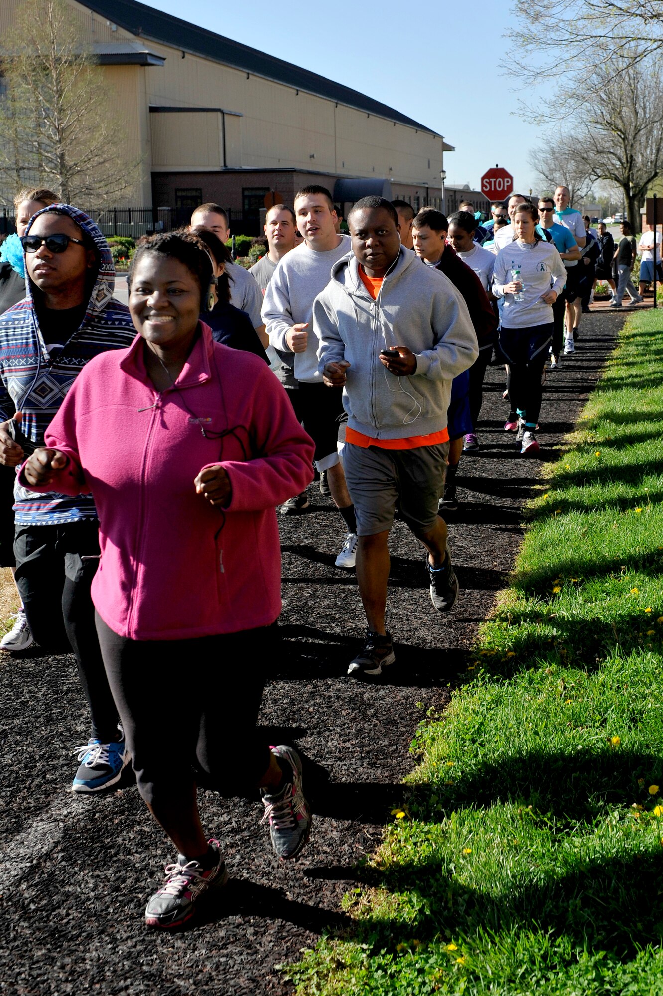 The 325 participants began the 5k run April 25, 2014 at Scott Air Force Base, Ill. Some participants wore the color teal to represent sexual assault awareness and prevention. "Not only did units show up in full teal force, their commanders were right there with them," said 1st Lt. Danielle Duso, the deputy Sexual Assault Response Coordinator. (U.S. Air Force photo/ Airman 1st Class Kiana Brothers)