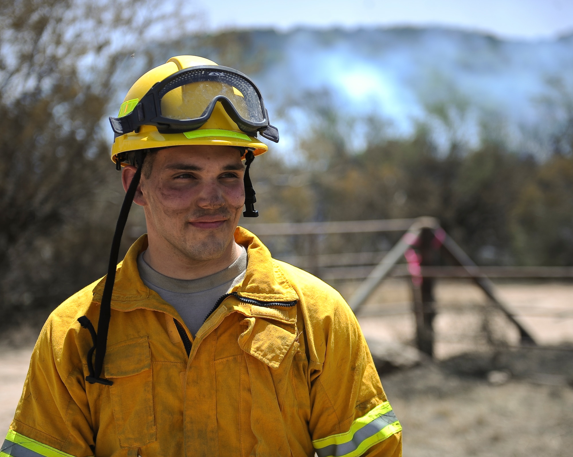U.S. Air Force Airman 1st Class Richard Thomas, 7th Civil Engineer Squadron firefighter, assisted with the containment of a 1,600 acre wildfire April 28, 2014, near Buffalo Gap, Texas. Seven Dyess firefighters along with numerous other firefighters from the surrounding Big Country region responded to the blaze. (U.S. Air Force photo by Airman 1st Class Kedesha Pennant/Released)