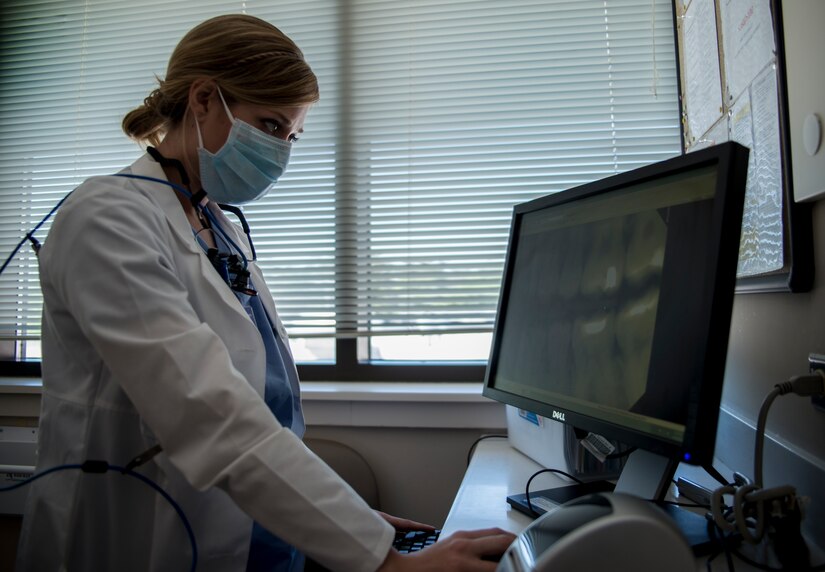 Capt. Mary Sorrentino, 628th Aerospace Medicine Squadron general dentist, checks a patient’s X-ray Apr. 16, 2014, at the 628th Medical Group dental clinic on Joint Base Charlston – Air Base, S.C. X-rays provide dentists with important information regarding the patient’s teeth and allow them to plan procedures accordingly. (U.S. Air Force photo/ Airman 1st Class Clayton Cupit)