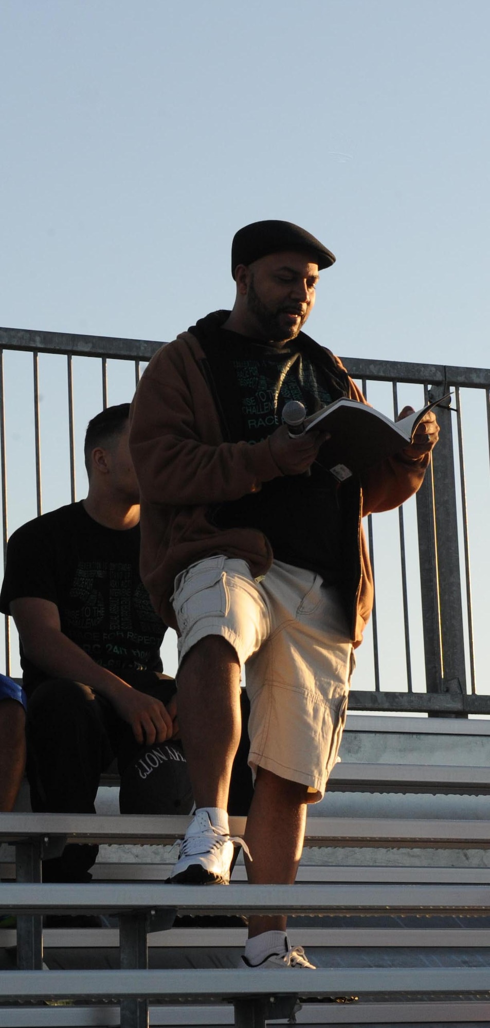 Robert McDaniel Sr., father of a victim of sexual assault, gives a speech before the 5K Race for Respect at Whiteman Air Force Base, Mo., April 25, 2014. McDaniel spoke about his family's experience with sexual assault and how they overcame their challenges. (U.S. Air Force photo by Airman 1st Class Joel Pfiester/Released)