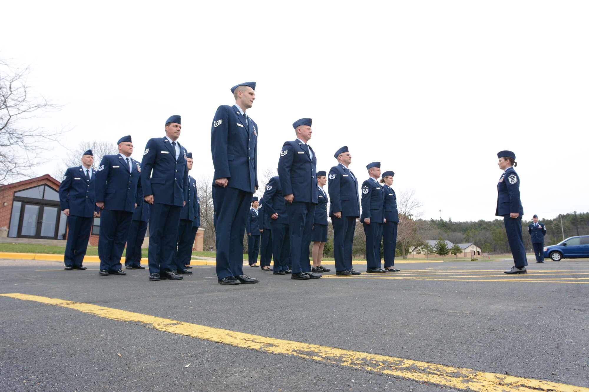 Command Chief Master Sgt. Gregory A. Cullen, Wisconsin’s senior enlisted leader, prepares to inspect Airmen during open ranks at Volk Field Air National Guard Base, Wis., April 23, 2014. The Airmen attended the second phase of the inaugural State Enlisted Development Program. (Air National Guard photo by Senior Airman Andrea F. Liechti)