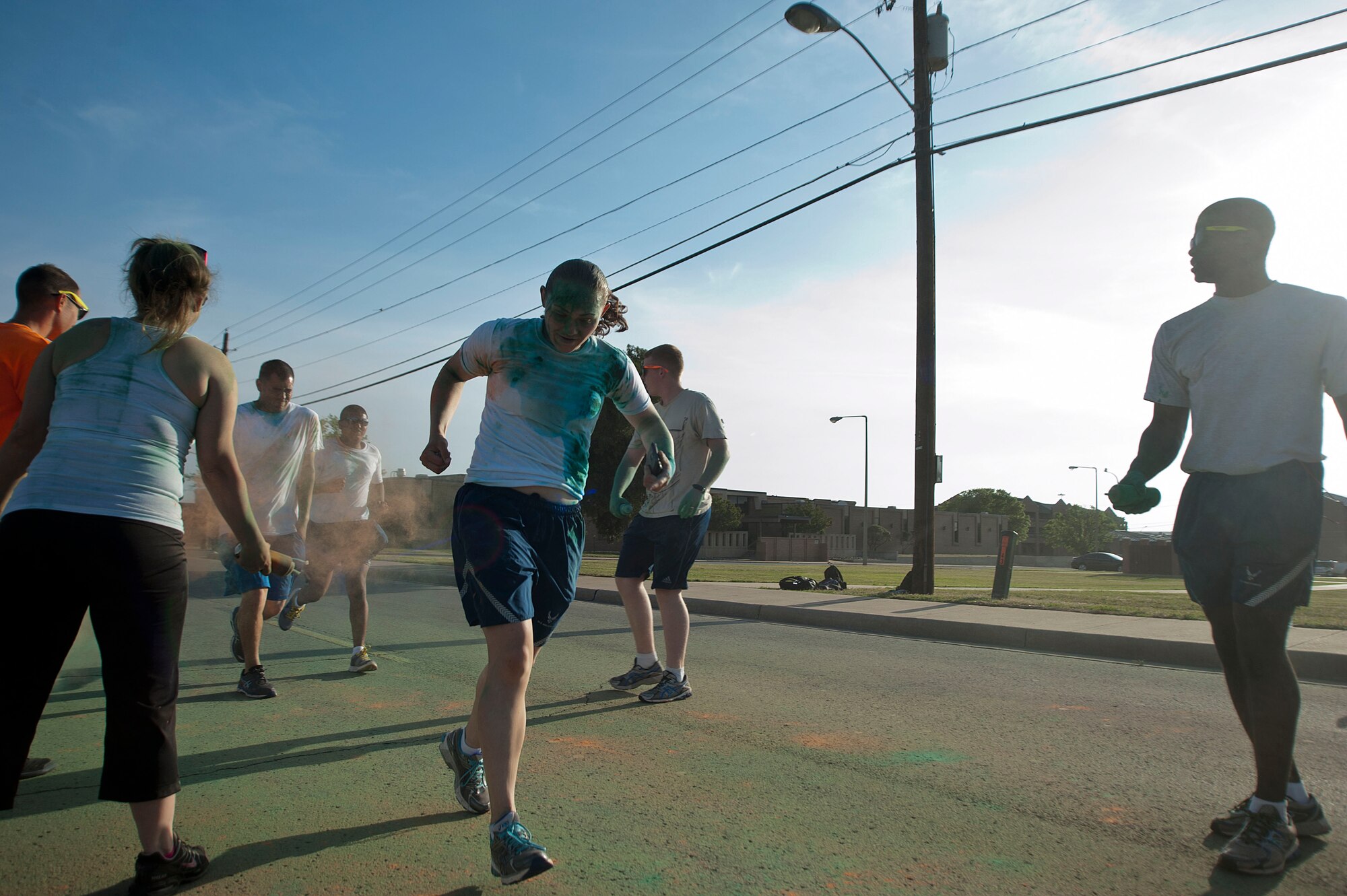 A 5k color run for Sexual Assault Awareness Month and Month of the Military Child took place April 26, 2014. The event was meant to raise awareness for both months and their importance to national and military culture. (U.S. Air Force photos by Airman 1st Class Jelani Gibson) 