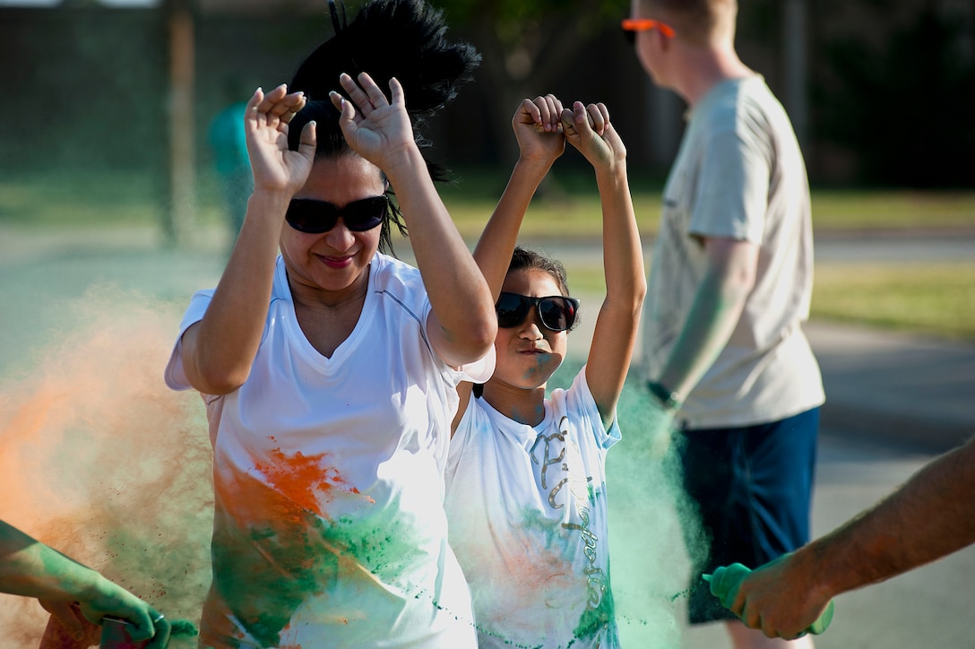 A 5k color run for Sexual Assault Awareness Month and Month of the Military Child took place April 26, 2014. The event was meant to raise awareness for both months and their importance to national and military culture. (U.S. Air Force photos by Airman 1st Class Jelani Gibson) 