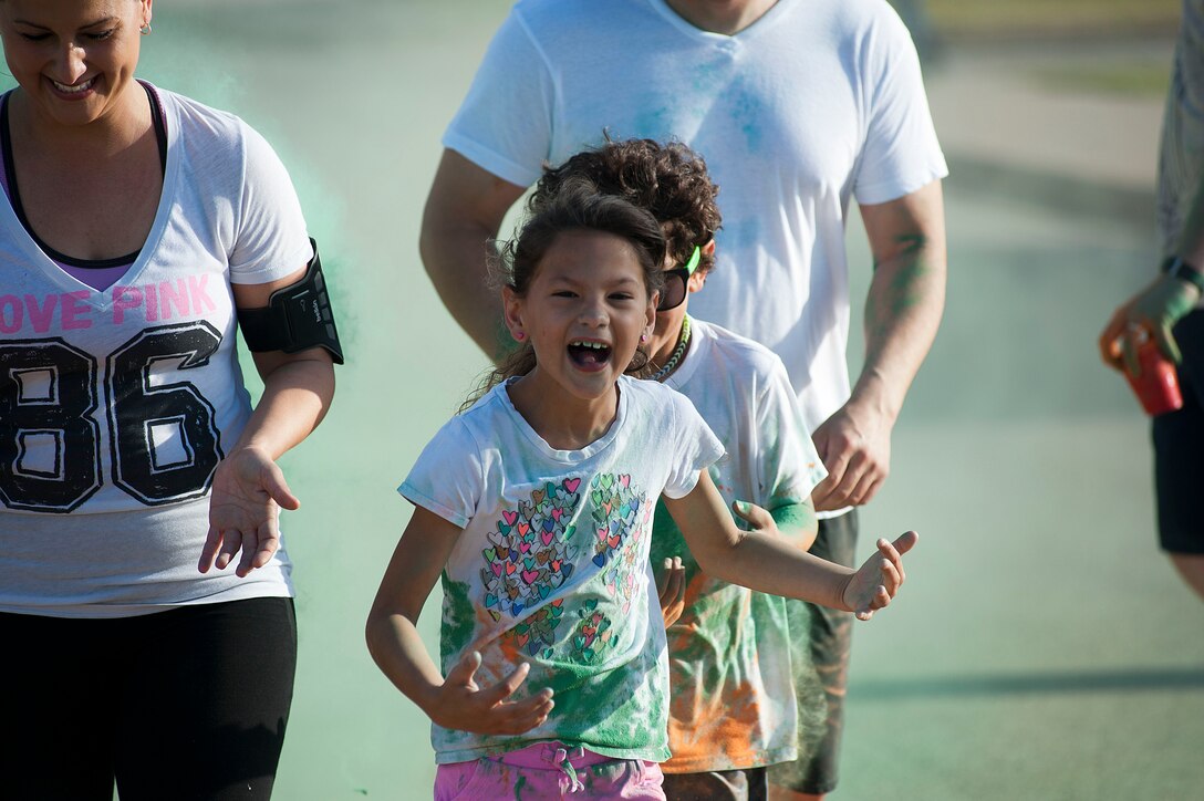 A 5k color run for Sexual Assault Awareness Month and Month of the Military Child took place April 26, 2014. The event was meant to raise awareness for both months and their importance to national and military culture. (U.S. Air Force photos by Airman 1st Class Jelani Gibson) 