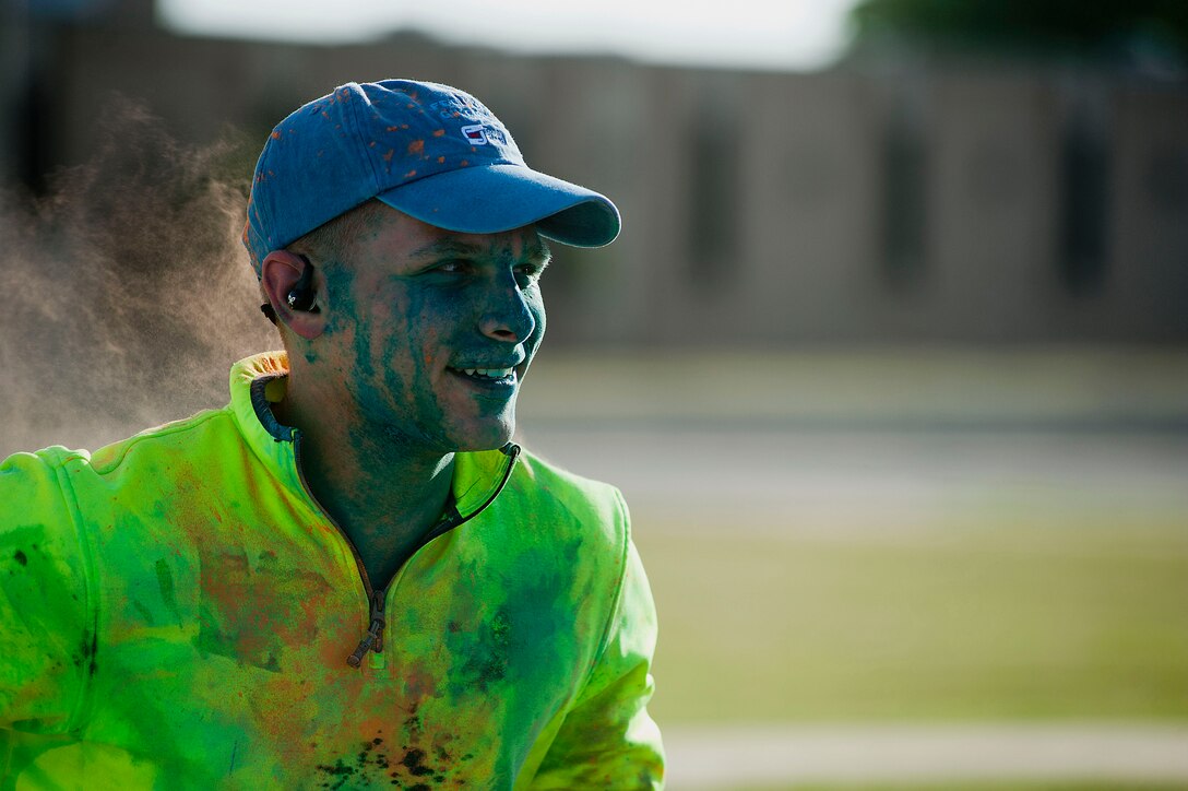 A 5k color run for Sexual Assault Awareness Month and Month of the Military Child took place April 26, 2014. The event was meant to raise awareness for both months and their importance to national and military culture. (U.S. Air Force photos by Airman 1st Class Jelani Gibson) 