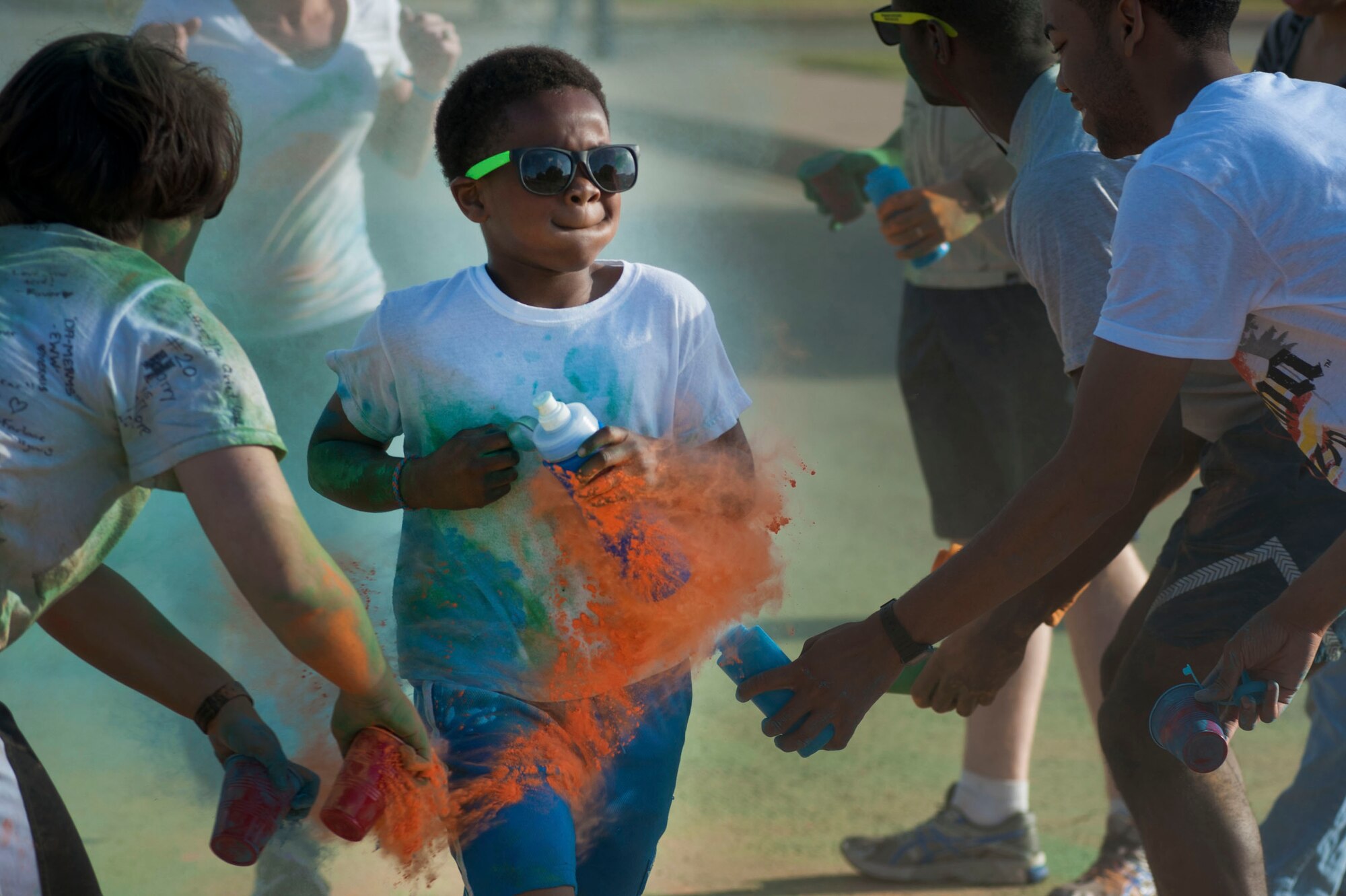 A 5k color run for Sexual Assault Awareness Month and Month of the Military Child took place April 26, 2014. The event was meant to raise awareness for both months and their importance to national and military culture. (U.S. Air Force photos by Airman 1st Class Jelani Gibson) 