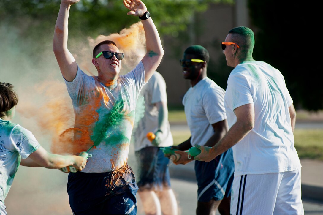 A 5k color run for Sexual Assault Awareness Month and Month of the Military Child took place April 26, 2014. The event was meant to raise awareness for both months and their importance to national and military culture. (U.S. Air Force photos by Airman 1st Class Jelani Gibson) 