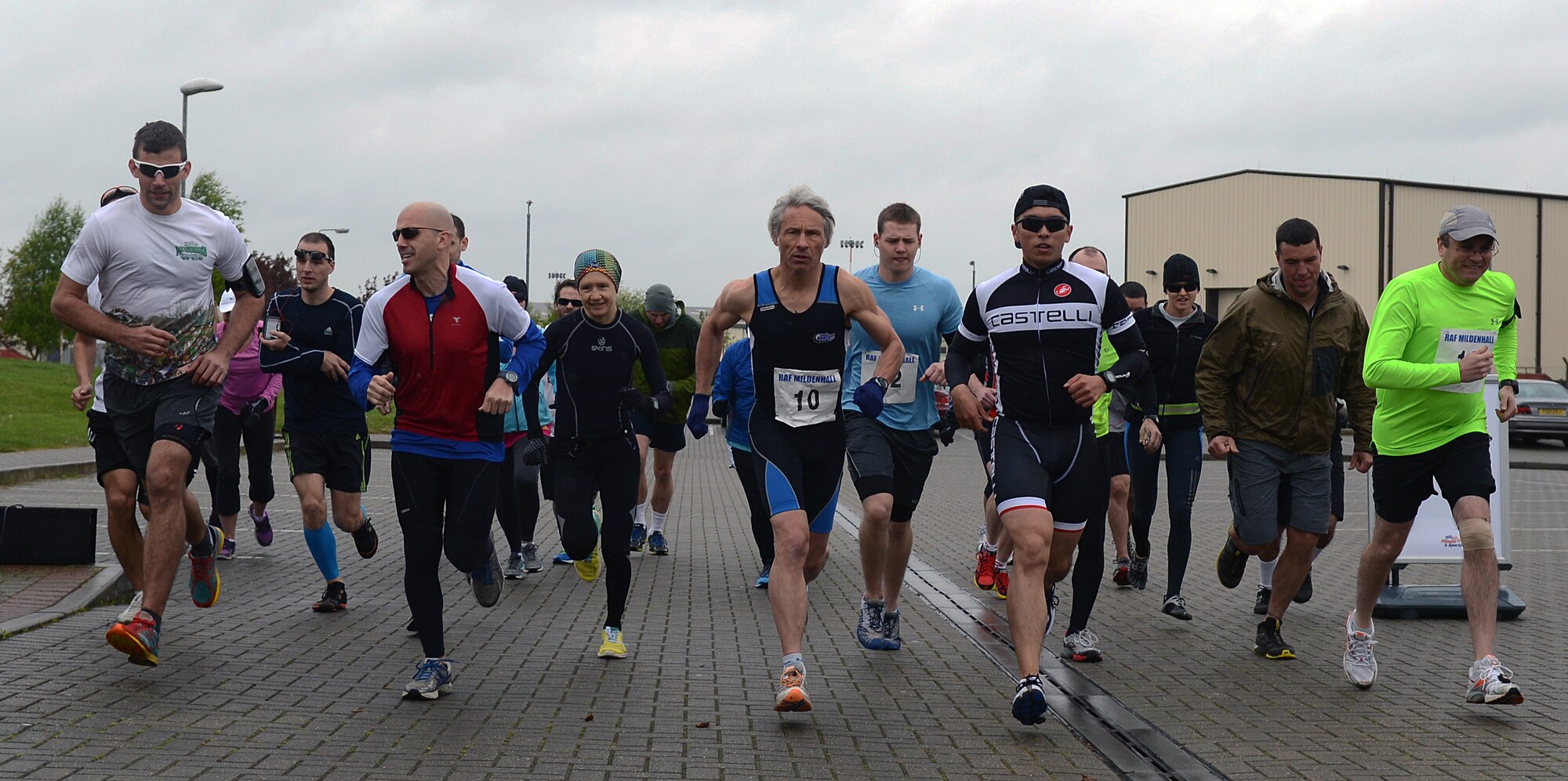 Team Mildenhall members begin the 100th Force Support Squadron’s duathlon April 26, 2014, on RAF Mildenhall, England. The event consisted of running two miles, biking approximately 20 miles and then running another two miles. (U.S. Air Force photo by Airman 1st Class Jonathan Light/Released)