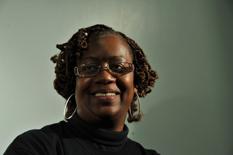LaNesa Howard, 42nd Air Base Wing sexual assault response coordinator, poses for a photograph in her office on Maxwell Air Force Base 18 April, 2014. In addition to her duties as the SARC, Howard runs the grief and loss sessions held at the Airmen Resiliency Center, designed to help anyone with base access heal from the emotional pain of grief and loss.(U.S. Air Force photo by Staff Sgt. Gregory Brook)