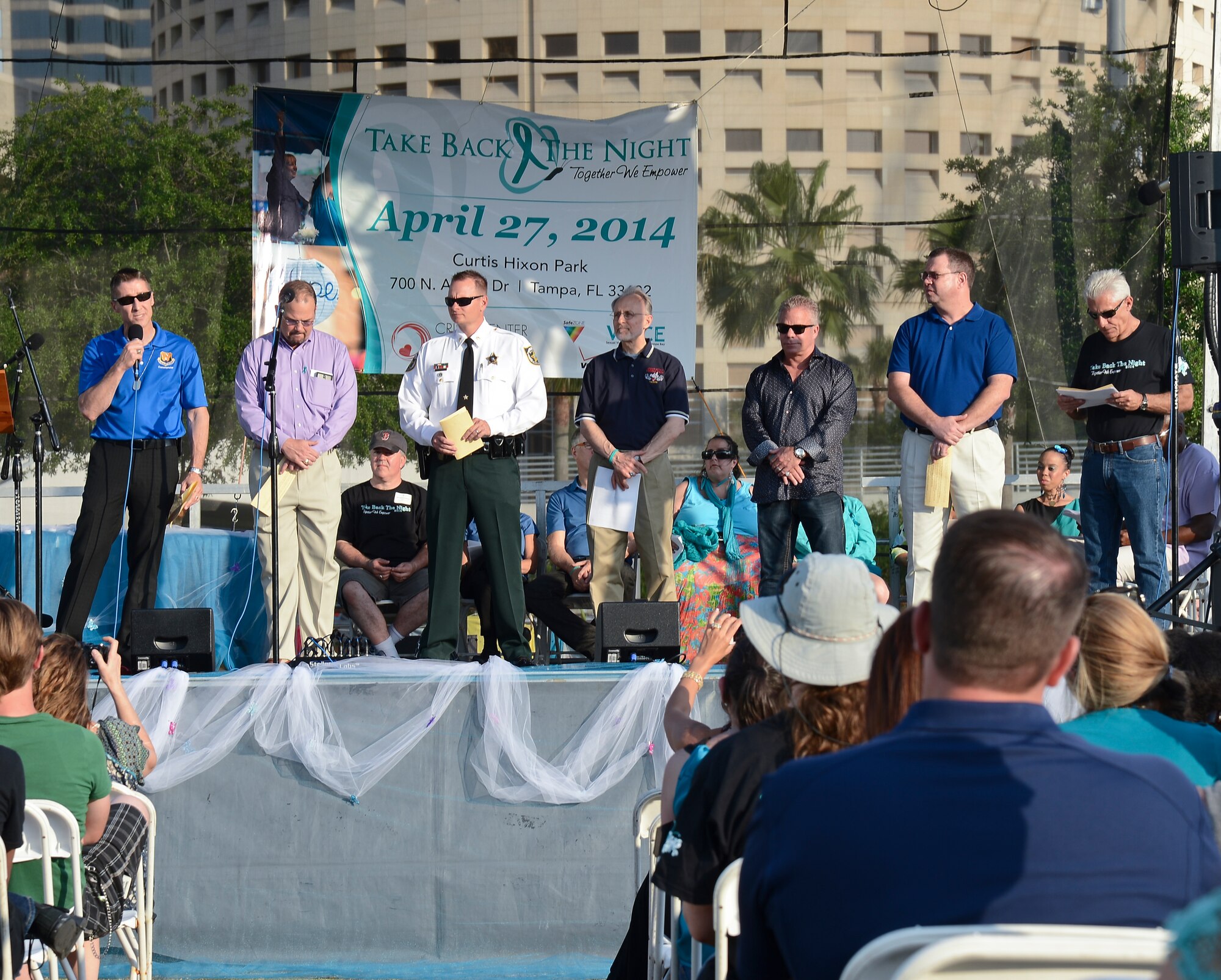 Col. Scott DeThomas, 6th Air Mobility Wing commander, states his pledge to end sexual violence at the Sexual Violence Task Force of Tampa Bay’s, in collaboration with the Crisis Center of Tampa Bay, “Take Back the Night” event at Curtis Hixon Park in Tampa, Fla., April 27, 2014. DeThomas and six other men representing various organizations around the Tampa community each stated the pledge to help end sexual violence. (U.S. Air Force photo by Airman 1st Class Vernon L. Fowler Jr./Released)