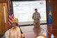 Capt. Natasha Fitzsimmons, a Special Victims’ Counsel lawyer, briefs Joint Base McGuire-Dix-Lakehurst senior leaders about the SVC program and what it offers Airmen Sept. 30, 2013, at JB MDL, N.J. Fitzsimmons is one of 24 lawyers in the Air Force assigned to independently counsel sexual-assault victims. (U.S. Air Force photo by Wayne Russell/Released)