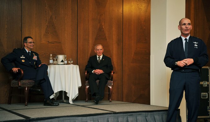 Maj. Gen. Jim Keffer (right), U.S. Cyber Command Chief of Staff, speaks at his father’s retirement ceremony April 25, 2014, at Ramstein Air Base, Germany. Robert Keffer retired after serving 57 years of service. Until his retirement, Keffer had been the Plans Programs and Resources chief to the 86th Communications Squadron, the largest communications squadron within the U.S. Air Force. He supported a major command, one numbered Air Force, three wings and 125 associated units. (U.S. Air Force photo/Senior Airman Hailey Haux)