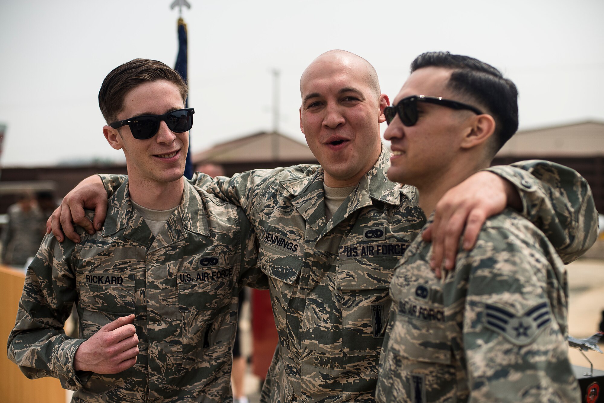 The 25th Aircraft Maintenance Unit weapons load crew team celebrates their victory in the 2014 Korean Peninsula Weapons Loading Competition April 26, at Osan Air Base, Republic of Korea. Their victory designates the 25th AMU as the best weapons loading crew in the country. (U.S. Air Force photo by Staff Sgt. Jake Barreiro)