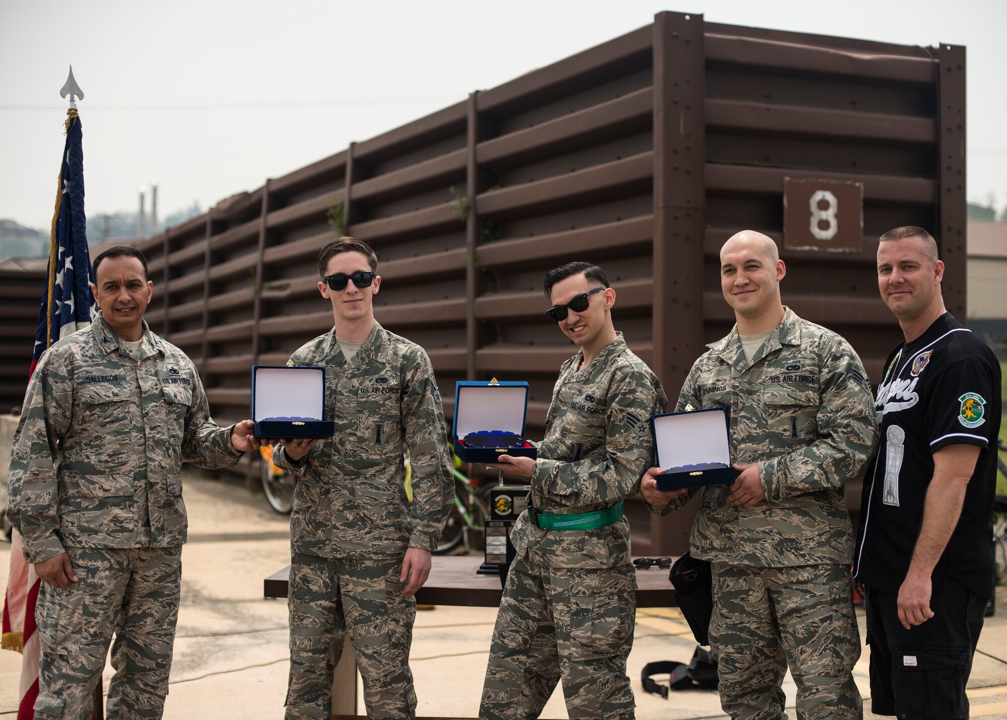 The 25th Aircraft Maintenance Unit weapons load crew team wins the 2014 Korean Peninsula Weapons Loading Competition April 26, at Osan Air Base, Republic of Korea. The 25th AMU completed the loading of their A-10 in 12:35 and outperformed three others teams to win the competition. (U.S. Air Force photo by Staff Sgt. Jake Barreiro)