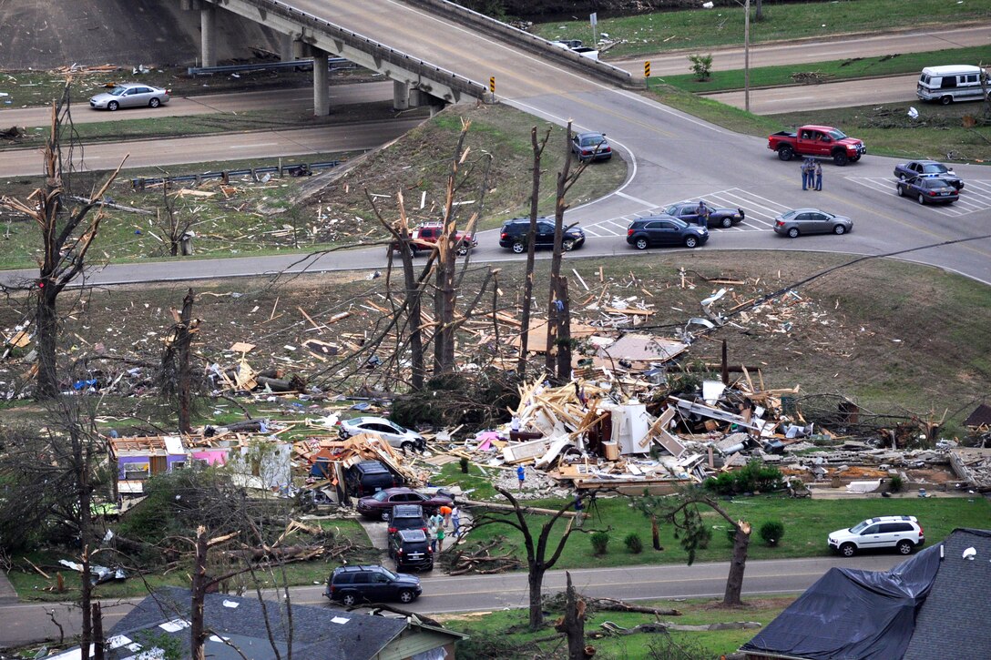 An aerial view shows tornado damage to houses in Tupelo, Miss., April 28, 2014.