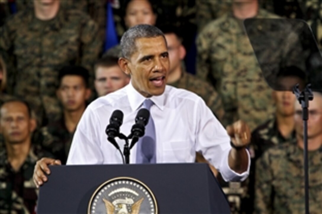 U.S. President Barack Obama speaks to U.S. and Philippine service members
at the Fort Bonifacio gymnasium in Manila, April 29, 2014. The president said he was in the Philippines during his fifth trip to Asia to "reaffirm our enduring alliance between our two countries." 