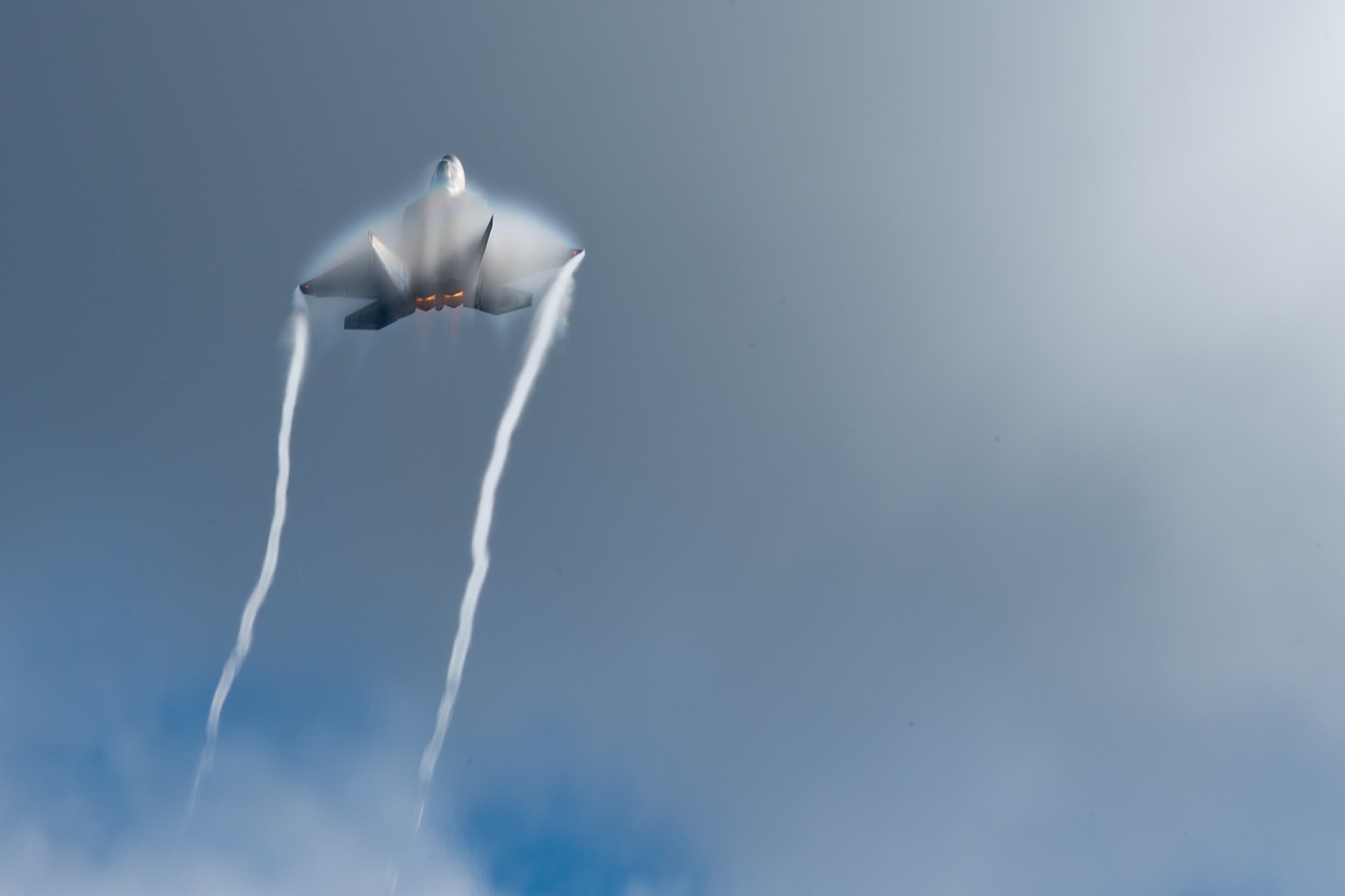 An F-22 Raptor performs aerial maneuvers July 25, 2014, in support of the Arctic Thunder Open House at Joint Base Elmendorf-Richardson, Alaska. Arctic Thunder, a biennial event, features more than 40 Air Force, Army and civilian aerial acts and hosts a crowd of more than 200,000 people. It is the largest two-day event in the state and one of the premier aerial demonstrations in the world. The Raptor is assigned to the 90th Fighter Squadron, 3rd Operations Group, 3rd Wing at Elmendorf. (U.S. Air Force photo/Staff Sgt. Joseph Araiza)