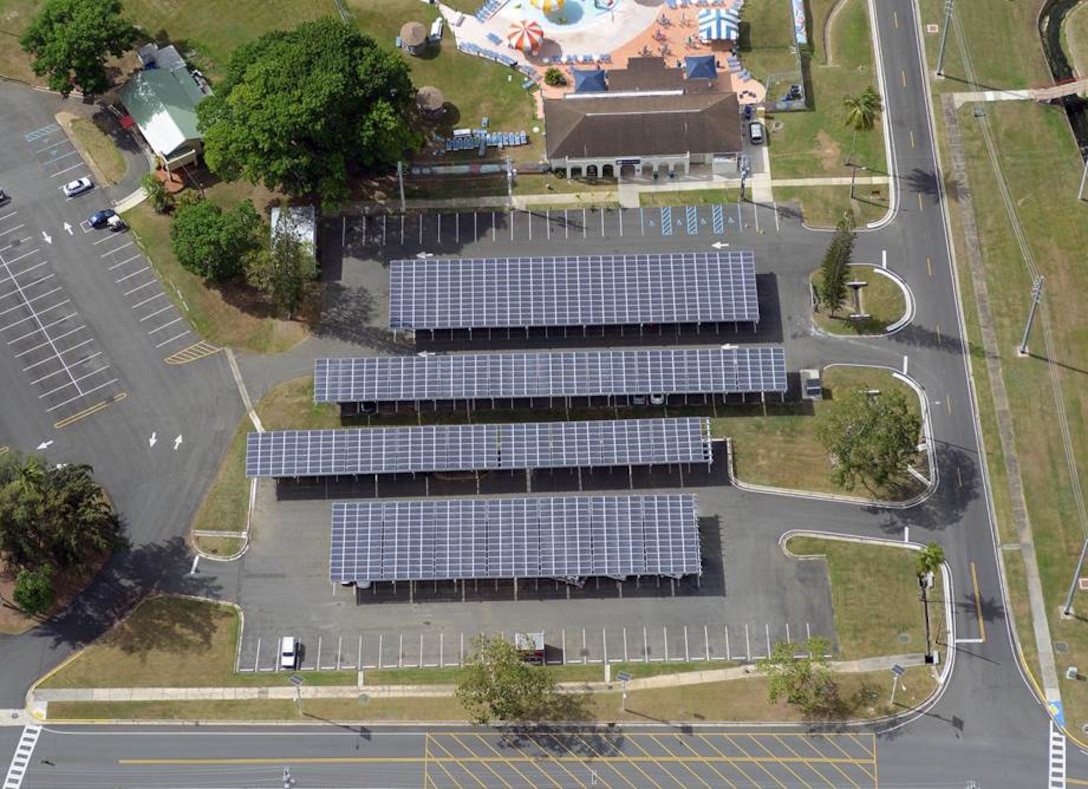 Parking canopies are one of many photovoltaic projects helping reduce energy consumption on Fort Buchanan, Puerto Rico. A total of 21,824 solar photovoltaic panels will produce about 5.5 megawatts of power, which is at least 60 percent of the installation's current power demand at its peak production.