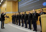 Sgt. Maj. of the Army Raymond F. Chandler III leads the induction of 10 soldiers assigned to DIA to the honorable title of noncommissioned officer July 29.