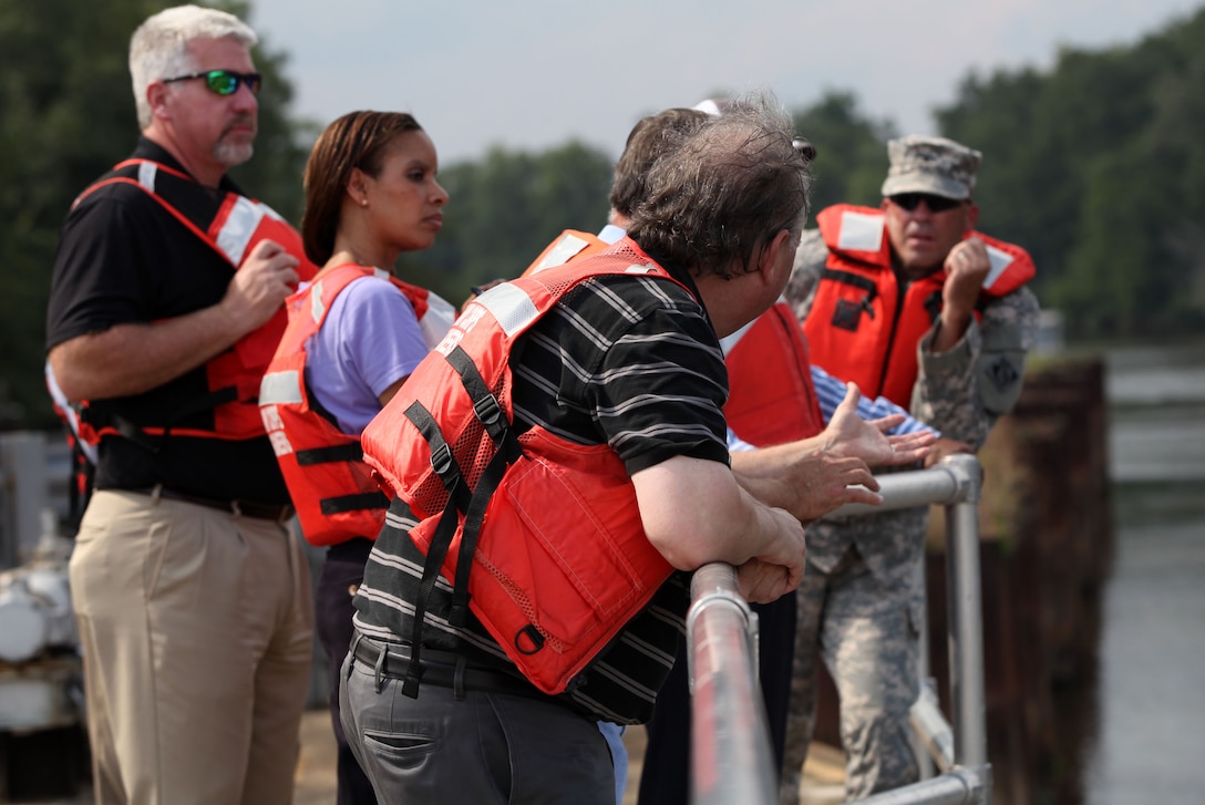 Wilmington District Commander Col. Kevin P. Landers, Sr., (far right) discusses construction improvements made at Lock and Dam #1 with visiting dignitaries.  Pictured (L-R) Bob Keistler, SAW project manager, Stacey Brown, Deputy Chief, SAD Regional Integration Team, and Elden Gatwood, SAW Chief of Planning and Environment. (ACE-IT photo by Elizabeth Colunga)