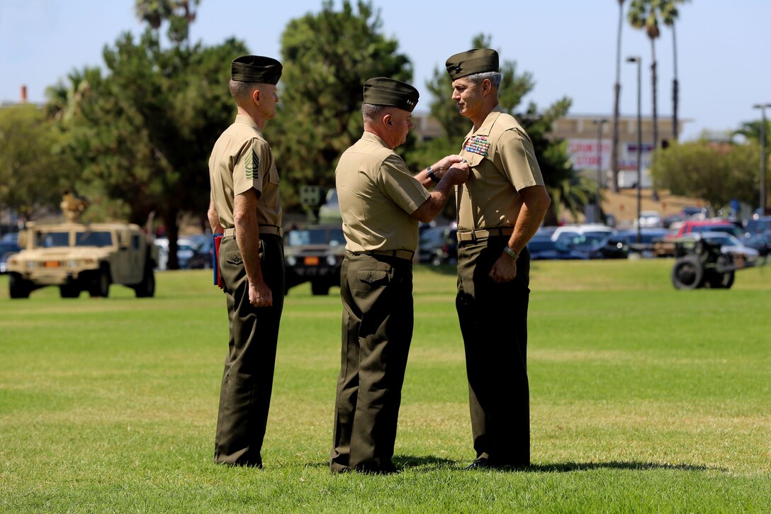 CAMP PENDLETON, Calif. - Brig. Gen John W. Bullard relinquished command of Marine Corps Installations West and Marine Corps Base Camp Pendleton to Brig. Gen. Edward D. Banta during a Change of Command at the 11 Area Parade Field Aug. 1.

Bullard who served as commanding general here since August 2013, acting as both the commanding general for Marine Corps Base Camp Pendleton as well as commanding general for MCI-West, is retiring after 31 years of honorable and faithful military service.

Before taking command of MCI-West, Banta served as the commanding general of 2nd Marine Logistics Group in Camp Lejeune. N.C.
