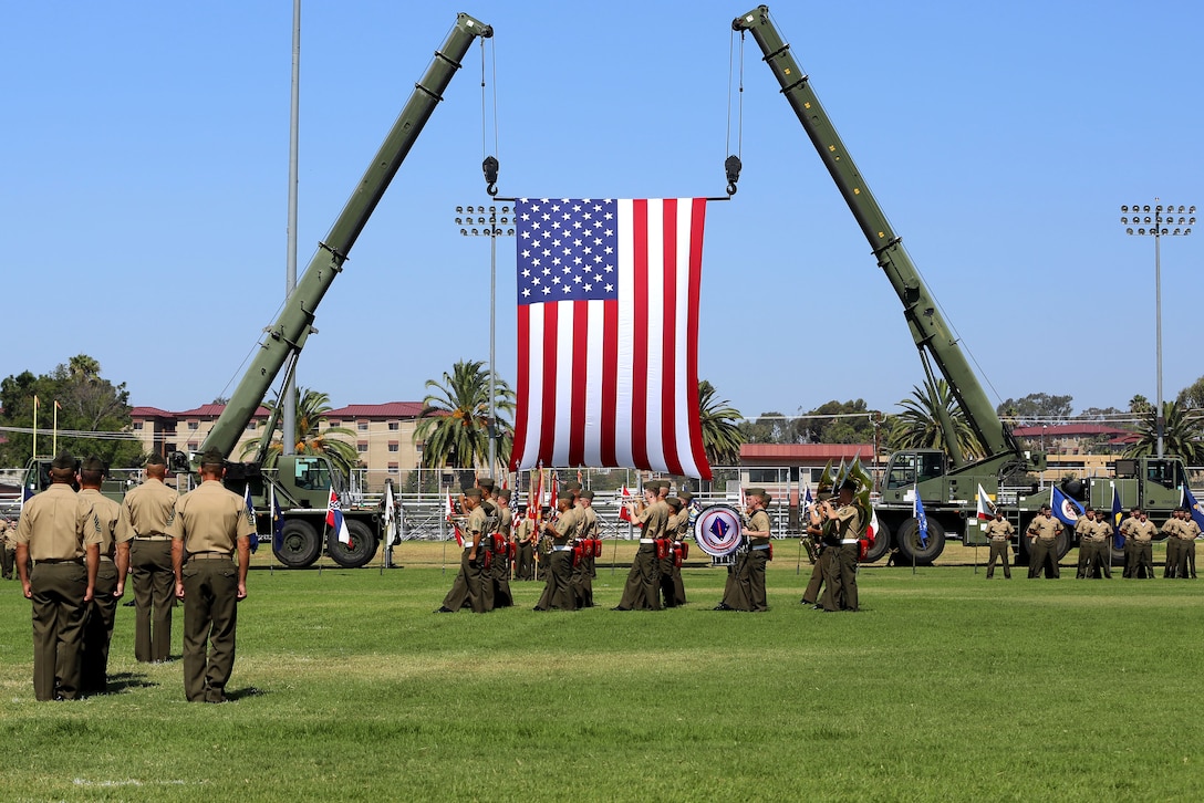 Brig. Gen. John W. Bullard relinquished command of Marine Corps Installations West and Marine Corps Base Camp Pendleton to Brig. Gen. Edward D. Banta during a Change of Command at the 11 Area Parade Field Aug. 1.

Bullard who served as commanding general here since August 2013, acting as both the commanding general for Marine Corps Base Camp Pendleton as well as commanding general for MCI-West, is retiring after 31 years of honorable and faithful military service.

Before taking command of MCI-West, Banta served as the commanding general of 2nd Marine Logistics Group in Camp Lejeune, N.C.
