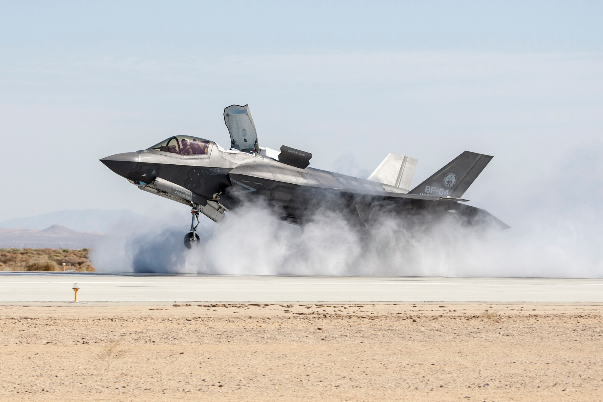 F-35B aircraft BF-4, piloted by Lockheed Martin Test Pilot Dan Levin, starts down the runway as part of wet runway and crosswind testing at Edwards AFB, Calif. (Photo by Tom Reynolds/Lockheed Martin)