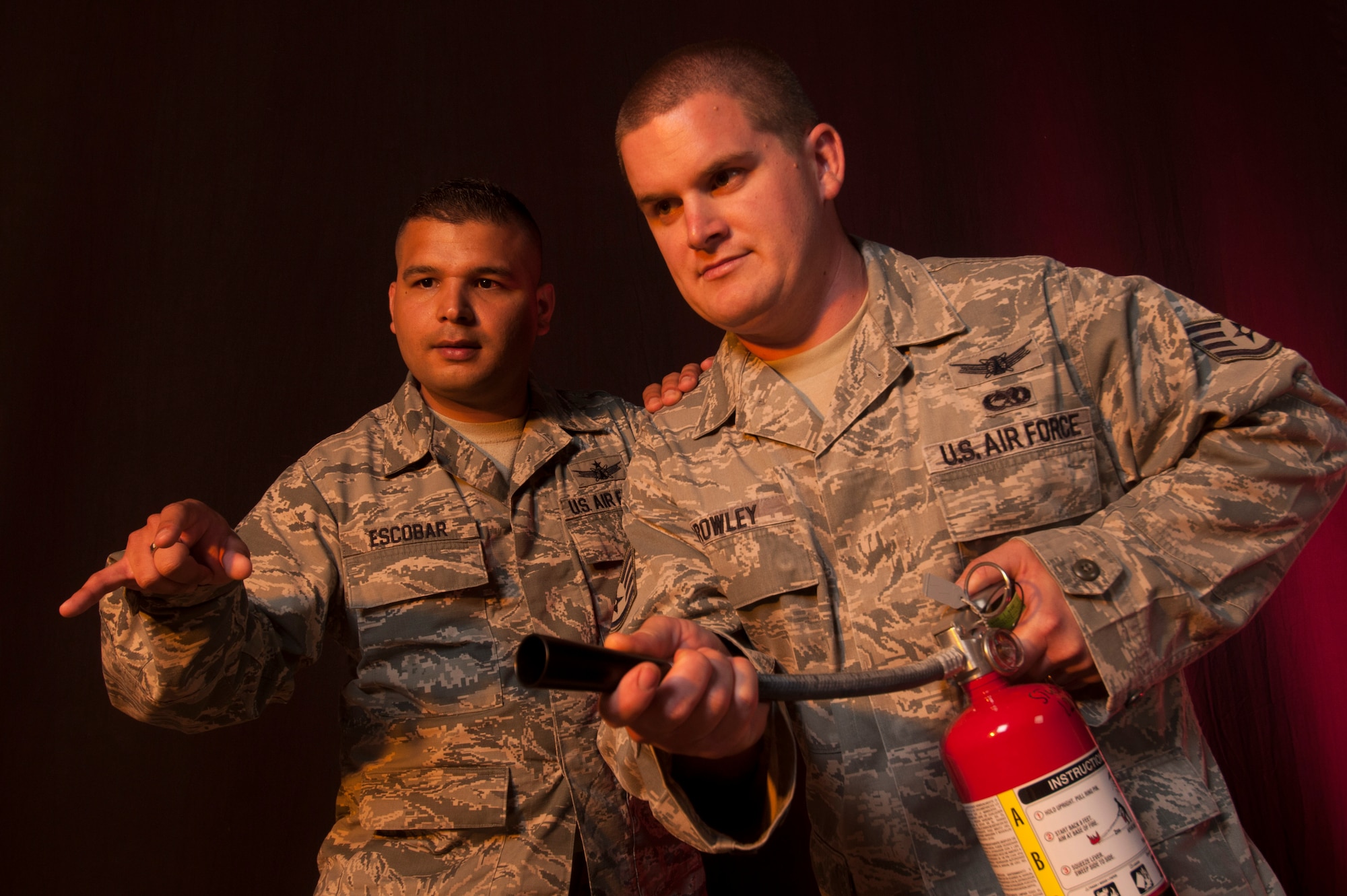 Staff Sgt. Eric Escobar, 614th Air and Space Operations Center space battle manager, and Staff Sgt. John Crowley, 9th Space Operations Squadron orbital protection duty technician, recently extinguished a vehicle fire, potentially saving the lives of two individuals, after departing the Santa Maria gate and heading northbound on Cabrillo Highway, July 18. (U.S. Air Force photo by Senior Airman Shane Phipps/Released)