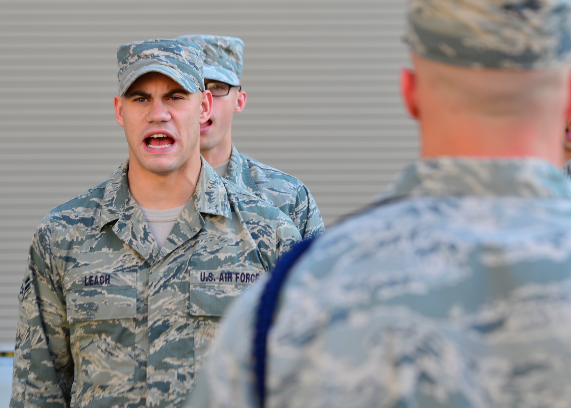 Airman 1st Class Austin Leach, 373d Training Squadron student, recites The Airman’s Creed July 28, 2014, at Dover Air Force Base, Del. Airmen in technical training perform drill movements and open ranks inspections that they learned in basic military training. (U.S. Air Force photo/Airman 1st Class William Johnson)