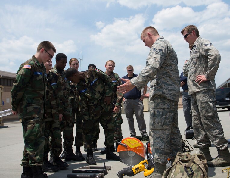 Pararescuemen from the 38th Rescue Squadron teach Civil Air Patrol cadets their deployed capabilities during a base tour July 31, 2014, at Moody Air Force Base, Ga.  Pararescuemen are capable of jumping out of aircraft up to 25,000 feet for Combat Search and Rescue contingencies.
(U.S. Air Force photo by Airman 1st Class Dillian Bamman/Released)
