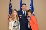 Maj. Gen. John Horner is flanked by his wife, Heather, and his mother, Mary Jo, after the two women pinned on the general’s second star at the Parr Club at Joint Base San Antonio-Randolph, Texas, July 25. The former Air Force Recruiting Service commander is now deputy director of the Defense Threat Reduction Agency at Fort Belvoir, Va. (U.S. Air Force photo/Johnny Saldivar)