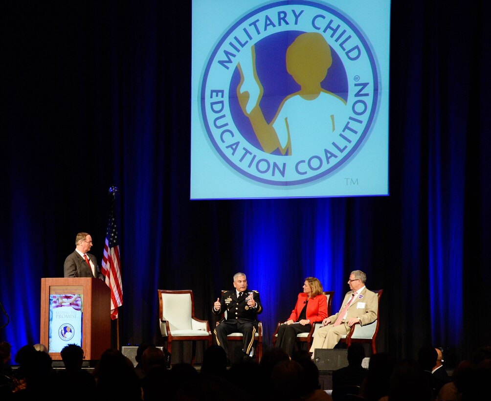 Army Vice Chief of Staff Gen. John F. Campbell discusses education with panelists DeEtte Gray, president of BAE Systems Intelligence & Security, and Michael Cohen, president of Achieve. The panel was part of the Military Child Education Coalition National Training Seminar in Washington, D.C., July 29, 2014. MCEC Board Vice Chairman David G. Henry Sr. moderates from the lectern. (U.S. Army photo by Staff Sgt. Laura M. Buchta)