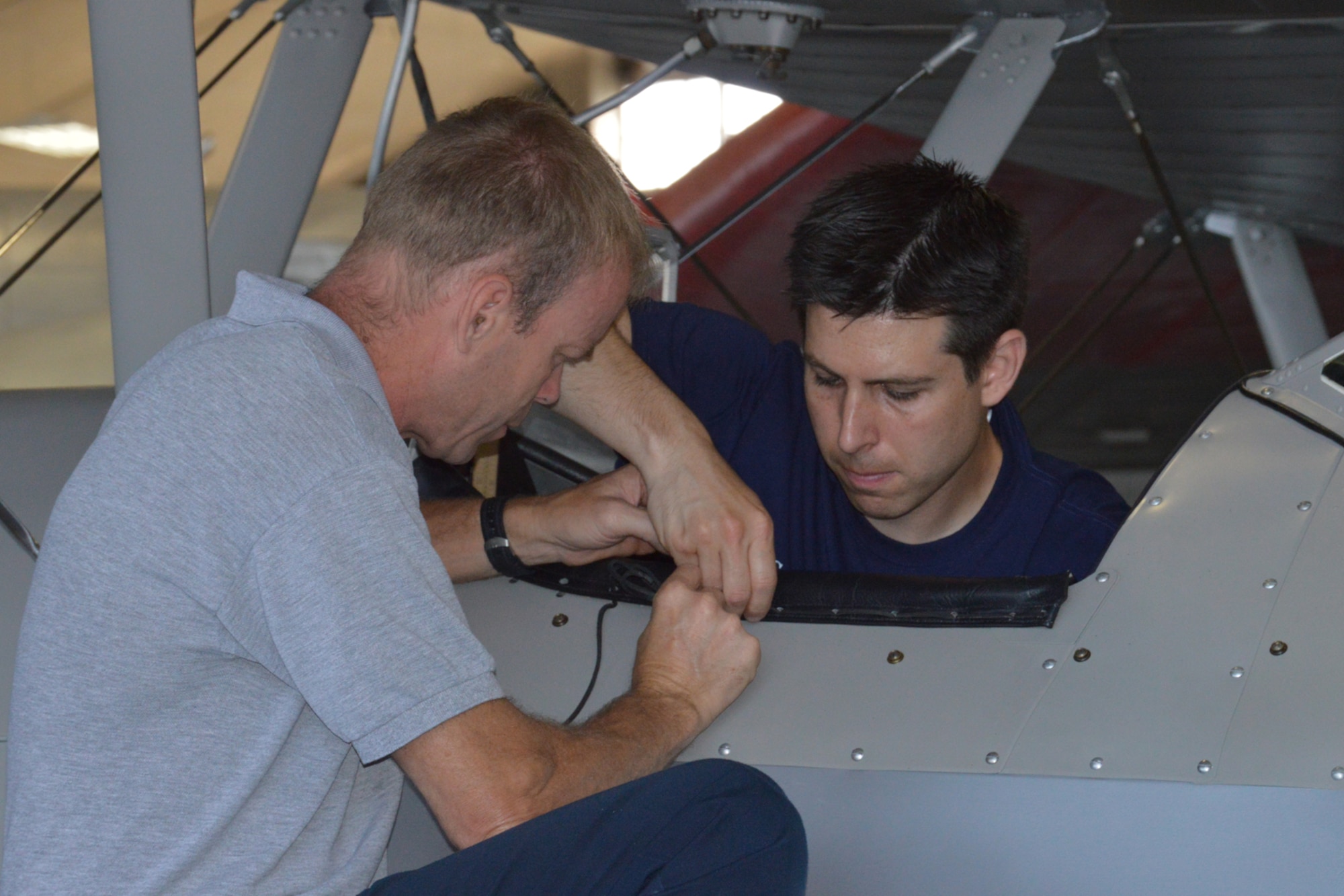 The leather trim around the PT-13's cockpit was sewn in place by museum restoration specialists. (U.S. Air Force photo)