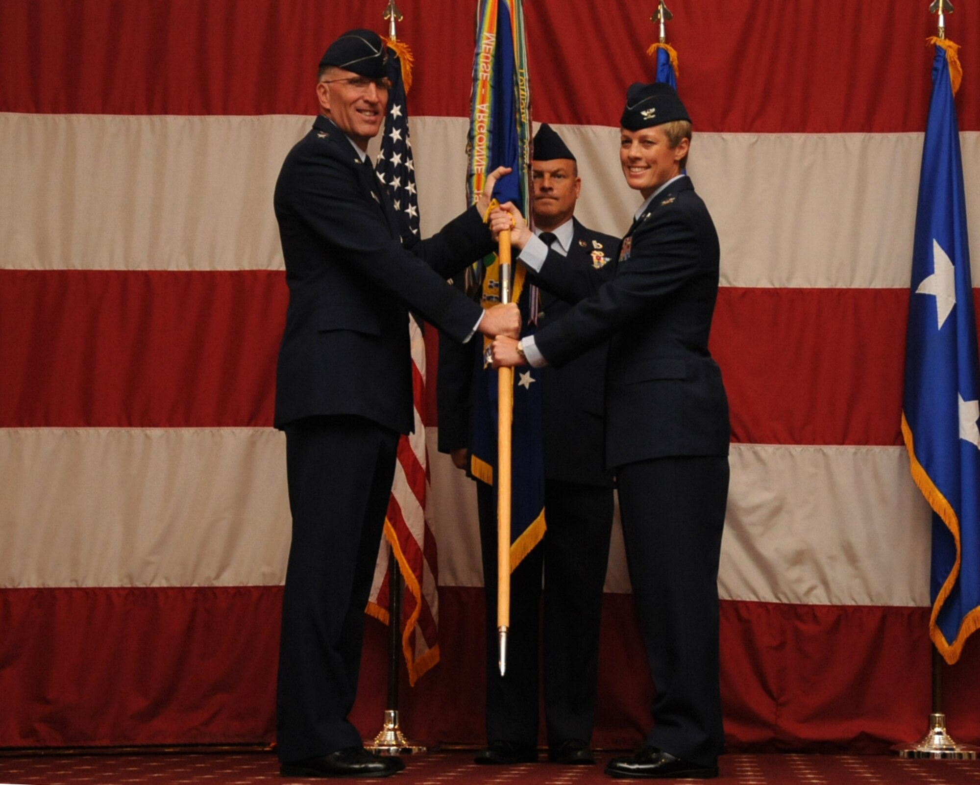 Col. Kristin Goodwin assumes command of the 2nd Bomb Wing from Maj. Gen. Scott Vander Hamm, 8th Air Force commander, during the 2 BW change of command ceremony on Barksdale Air Force Base, La., Aug. 1, 2014. The change of command ceremony is a military tradition that gives service members the opportunity to witness their new leader's assumption of command. Goodwin previously served as the vice commander of the 509th Bomb Wing at Whiteman AFB, Mo. (U.S Air Force photo/Staff Sgt. Sean Martin)


