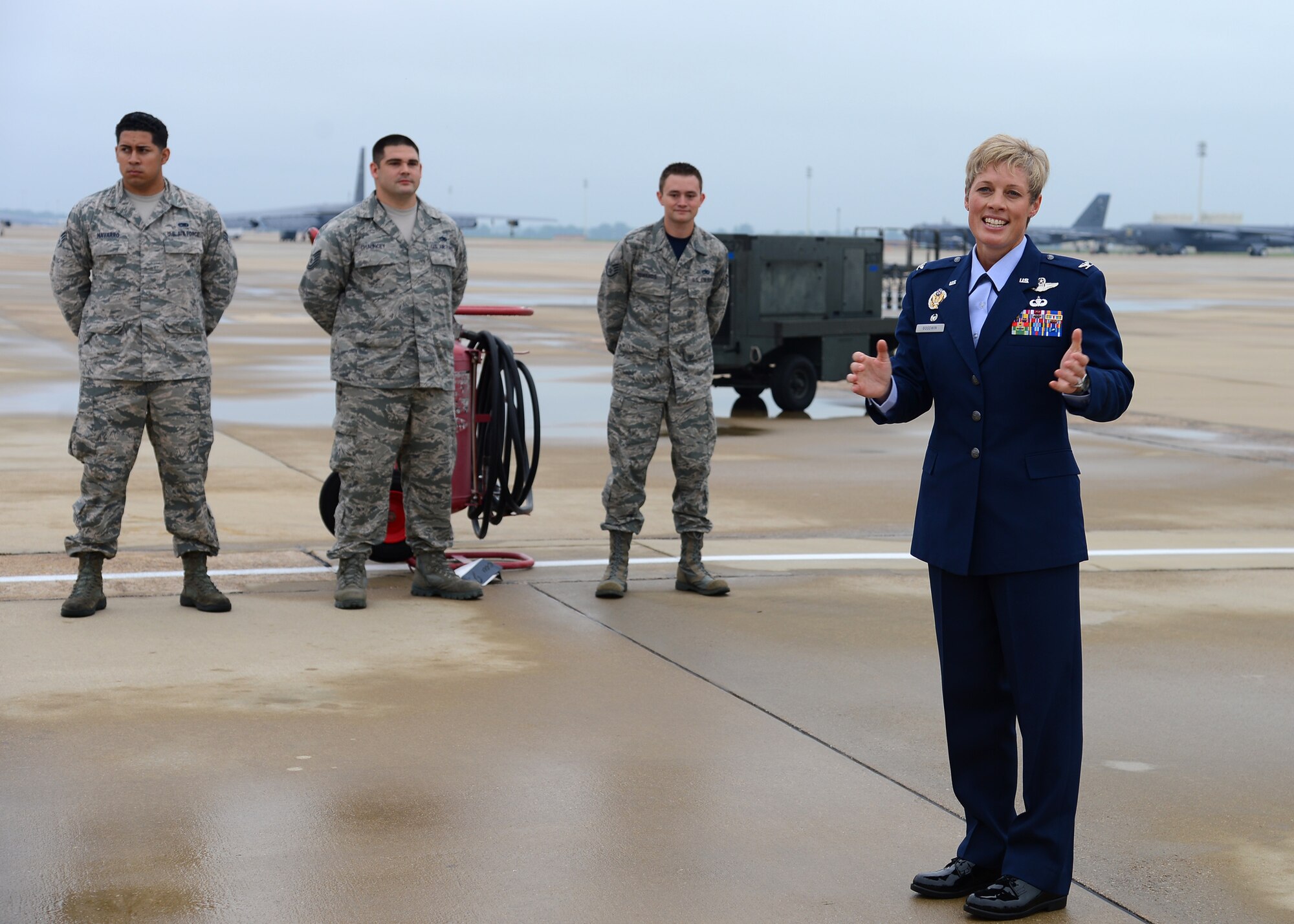 Col Kristin Goodwin, 2nd Bomb Wing commander, thanks all those in attendance after unveiling her name from the 2nd BW's flagship B-52H Stratofortress after her change of command ceremony on Barksdale Air Force Base, La., Aug. 1, 2014. As commander, Goodwin is responsible for providing combat-ready B-52H Stratofortress aircraft, crews and associated combat support to conduct global operational taskings. (U.S. Air Force photo/Tech. Sgt. Marie Brown)



