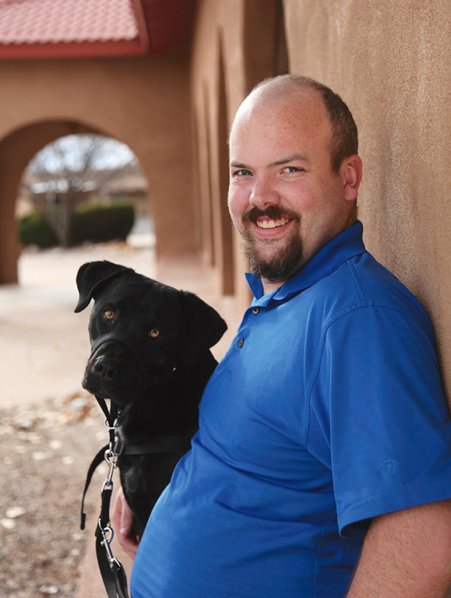 Marine Corps veteran Joshua Kendall and his service dog, Gromit, are among the vets and dogs brought together by Paws and Stripes. (Courtesy photo)
