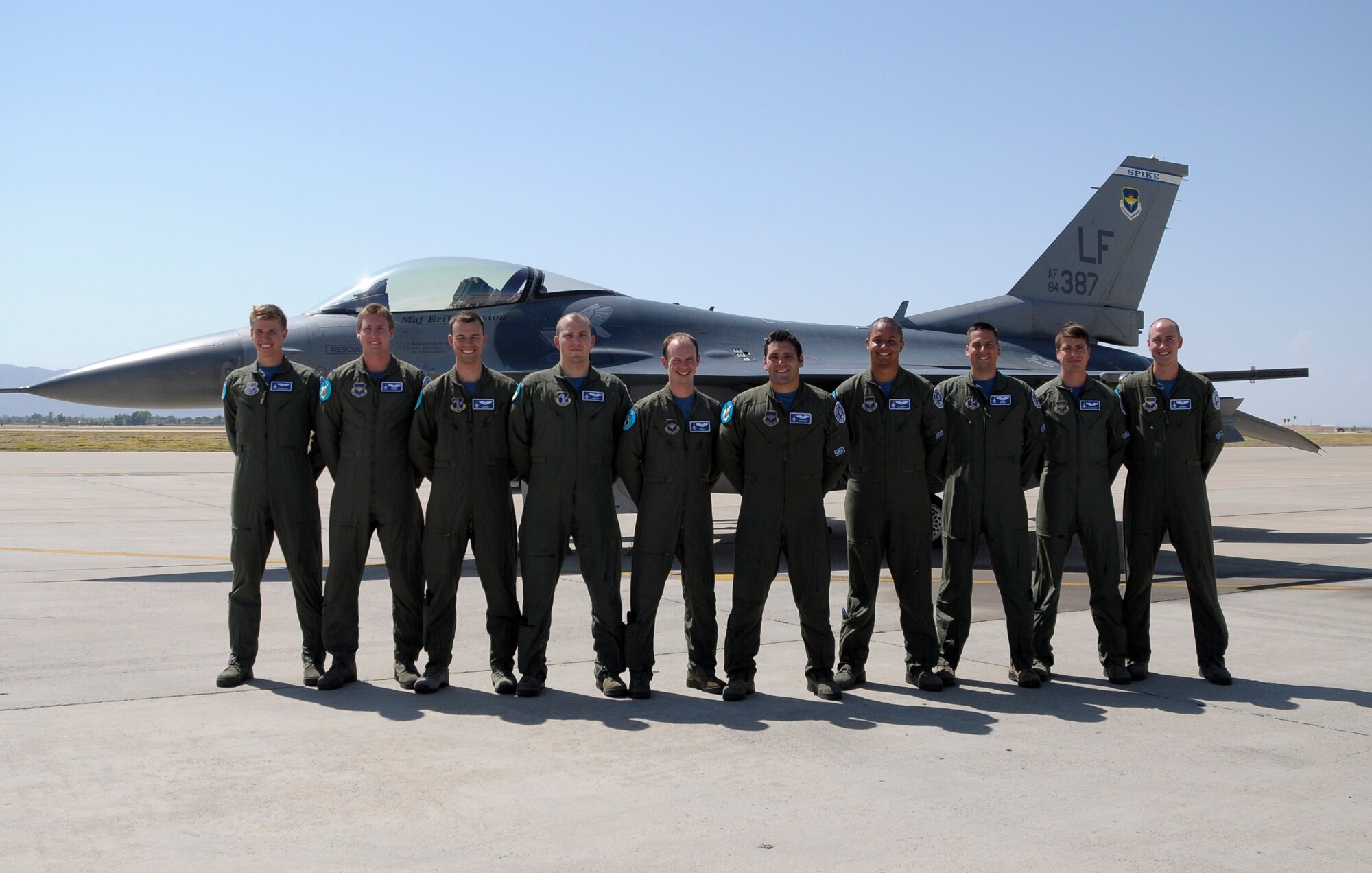 FROM LEFT: 1st Lts. Adam Fuhrmann, Mike Vasilou, Wesley Womble, Cody May, Aaron Frey, Ryan Loyd, Bryce Turner, Pete Fritz, Alex Tovani and Sean Rush graduate today from the 309th Fighter Squadron Class 14-ABC. (U.S. Air Force photo/Staff Sgt. Timothy Boyer)