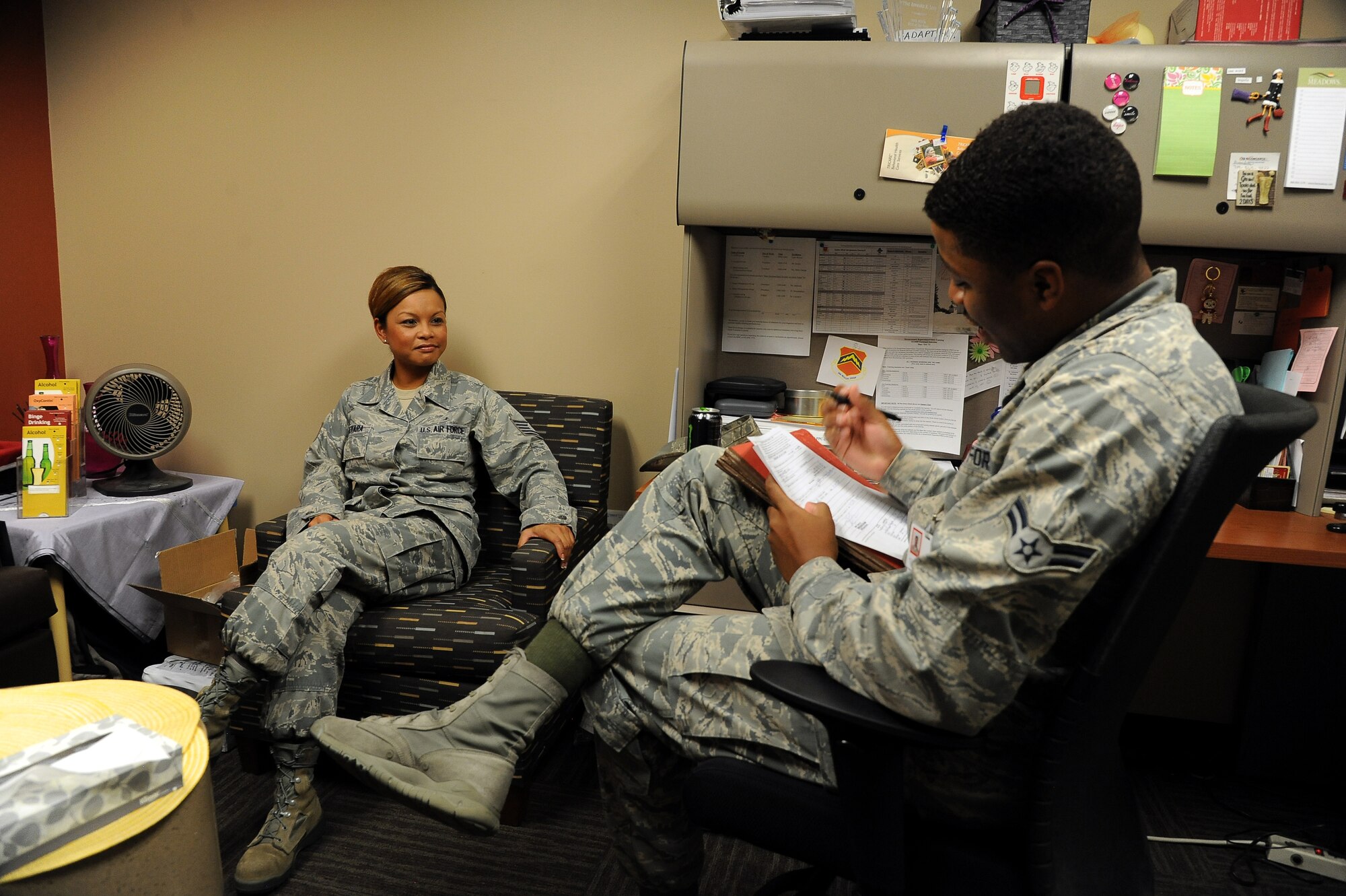 Airman 1st Class Jordan Ashlock, right, 56th Medical Operations Squadron mental health technician, interviews Tech. Sgt. MeShawn Guevara, 56th MDOS, during a mental health practice survey Monday at Luke Air Force Base. About one in 10 active-duty members report having mental health problems. The questionnaire will be distributed throughout the Luke community to help Luke members determine if they are in need of mental health services. (U.S. Air Force photo/Airman 1st Class Pedro Mota)
