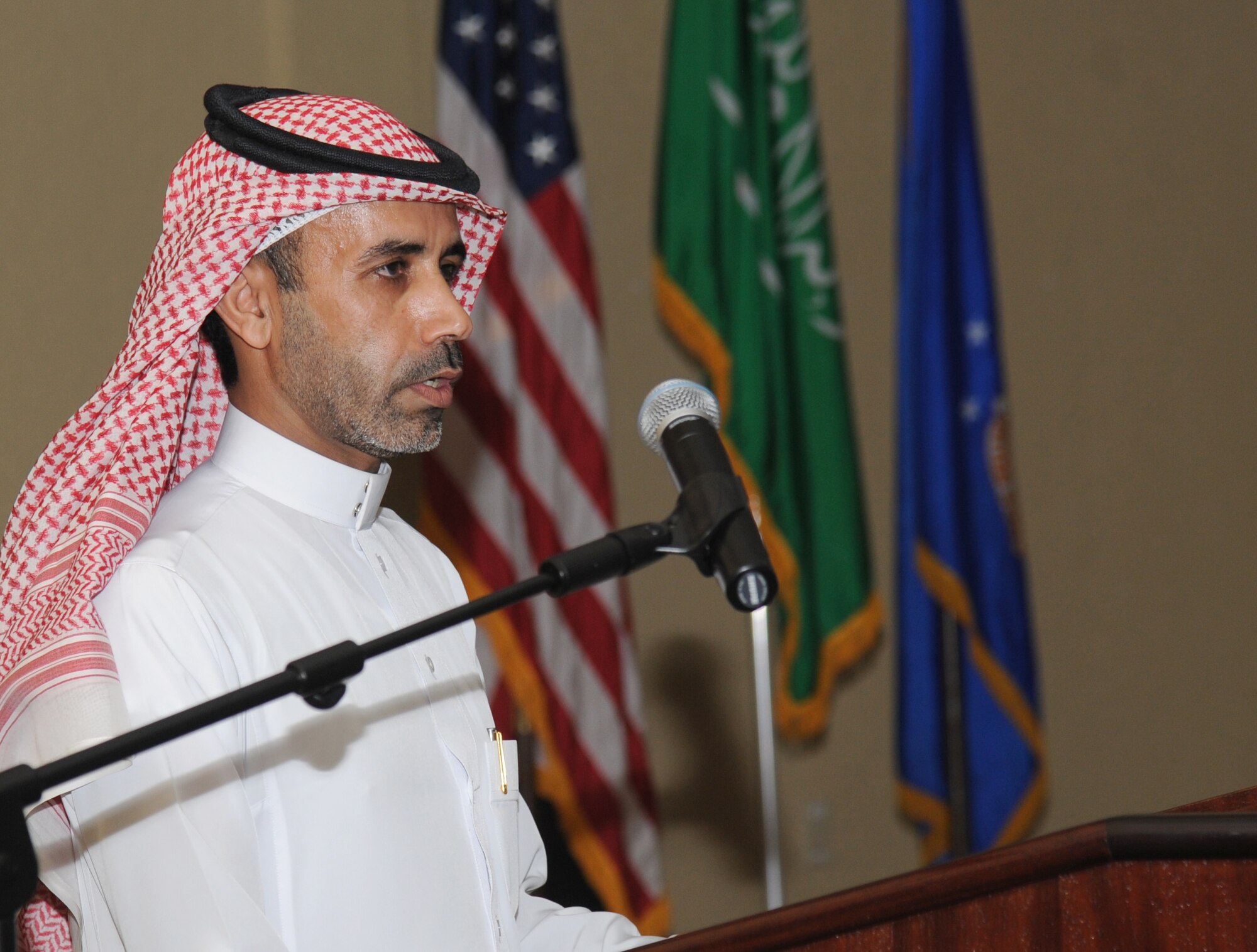 Lt. Col. Alloush Al-Dosari, Royal Saudi Air Force country liaison officer, delivers welcoming remarks during a luncheon to celebrate Eid al-Fitr, July 28, 2014, at the Bay Breeze Event Center, Keesler Air Force Base, Miss. Ramadan is a month dedicated to worship and repentance. Muslims worldwide observe this month by fasting from dawn until sunset. Eid al-Fitr is a three-day celebration that marks the end of Ramadan. (U.S. Air Force photo by Kemberly Groue)