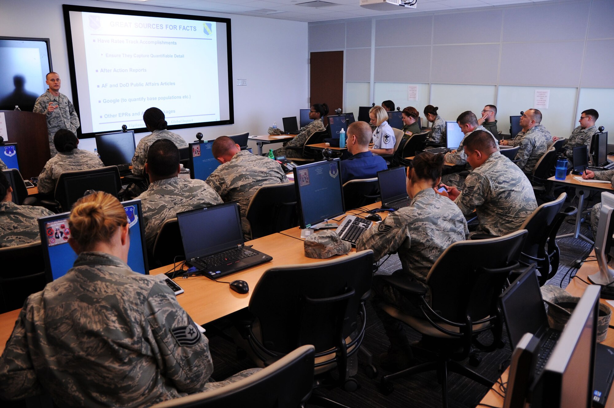 Master Sgt. Eric Villafana, 11th Wing First Sergeant, provides writing tips for Airmen during the Effective Bullet Writing Seminar on Joint Base Andrews, Maryland, July 30. The Joint Base Andrews First Sergeant Council held the seminar to try to better prepare supervisors to support their Airmen when writing evaluations and awards. (U.S. Air Force photo/Staff Sgt. Matt Davis)