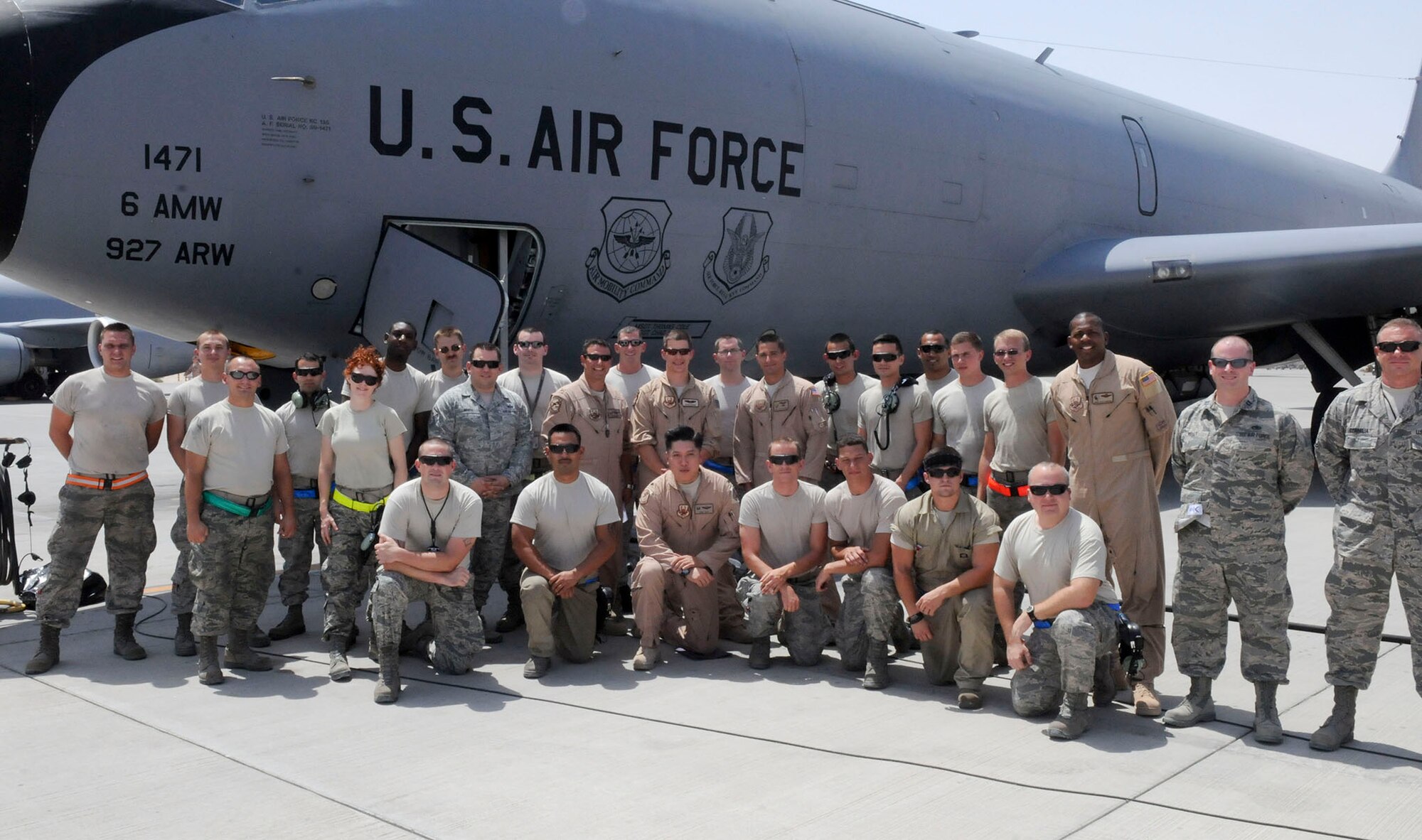 U.S. Air Force Airmen from the 340th Expeditionary Air Refueling Squadron pose for a group photo after setting a record of flying 1,108 sorties in one month at Al Udeid Air Base, Qatar, July 29, 2014. The 340th EARS has the largest community of KC-135 Stratotankers in the U.S. Central Command's area of responsibility. The previous record for flying sorties was 1,003. (U.S. Air Force photo by Senior Airman Colin Cates)