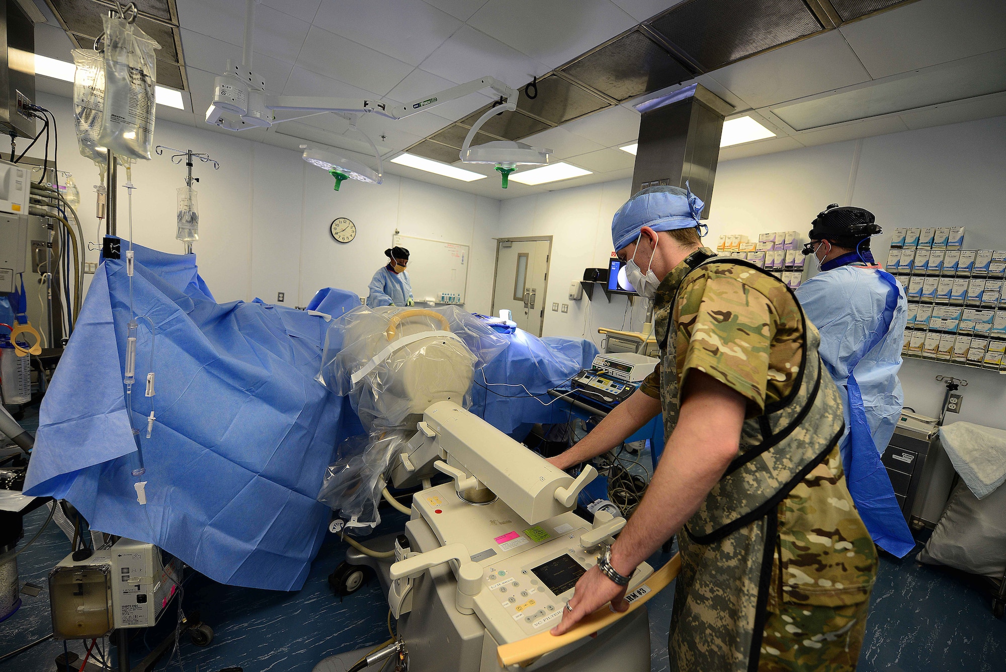 U.S. Air Force Staff Sgt. Matthew Egts, 455th Expeditionary Medical Support Squadron diagnostic imaging technologist, performs a flouroscopy at Craig Joint Theater Hospital in Bagram Airfield, Afghanistan July 27,2014.  A flouroscopy is an imaging technique that uses x-rays to obtain real-time moving images of a patient’s body. Egts is part of the eight-person Radiology team at Bagram who provide diagnostic imagery for routine and trauma patients around the clock. Egts is deployed from Joint Base San Antonio, Texas and a native of San Antonio, Texas.  (U.S. Air Force photo by Staff Sgt. Evelyn Chavez/Released) 