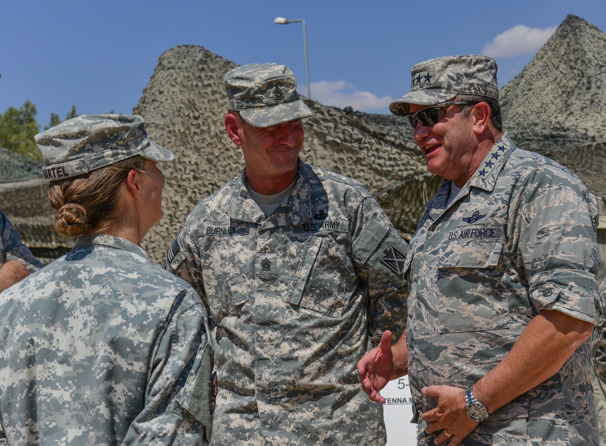 Army Lt. Col. Lisa Bartel, 5th Battalion commander, 7th Air Defense Artillery Regiment, 10th Army Air and Missile Defense Command, and Army Command Sgt. Maj. Stephen Burnley, senior enlisted soldier for 5-7 ADA, greet U.S. Air Force Gen. Philip M. Breedlove, NATO’s supreme allied commander for Europe and the commander of U.S. European Command July 31, 2014, Gaziantep, Turkey. During his visit, Breedlove toured Gaziantep and spoke to Soldiers about the importance of the NATO mission and their role in defending our Turkish counterparts. (U.S. Air Force photo by Senior Airman Nicole Sikorski/Released)