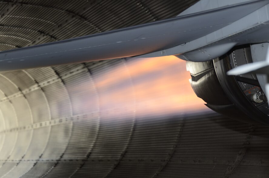 The engine of an F-16 Fighting Falcon is run-up to afterburner during an engine test in the hush house at Joe Foss Field S.D. July 30, 2014.  The hush house is a facility that allows a crew of Airmen to test jet engines on the ground after the engines have been repaired. Engines can be tested while installed on the aircraft or while on specialized mobile racks designed to hold the engine during maintenence.(National Guard photo by Senior Airman Duane Duimstra/Released)