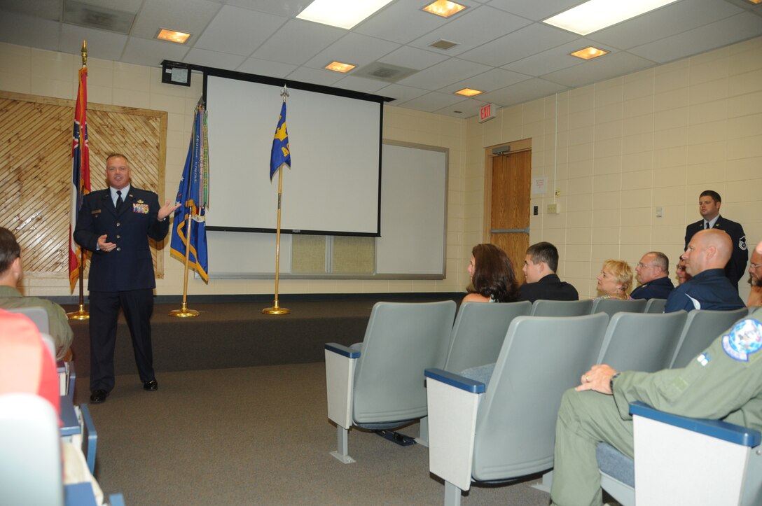 U. S. Air Force Col. Robert Parker, Director of Air, Space and Information Operations, 286 Air Component Operations Squadron, delivers a speech on Key Field Air National Guard Base, Meridian, Miss., Aug. 2, 2014. Parker was promoted to the rank of Colonel. (U. S. Air National Guard Photo by Tech. Sgt. Richard L. Smith/Released)